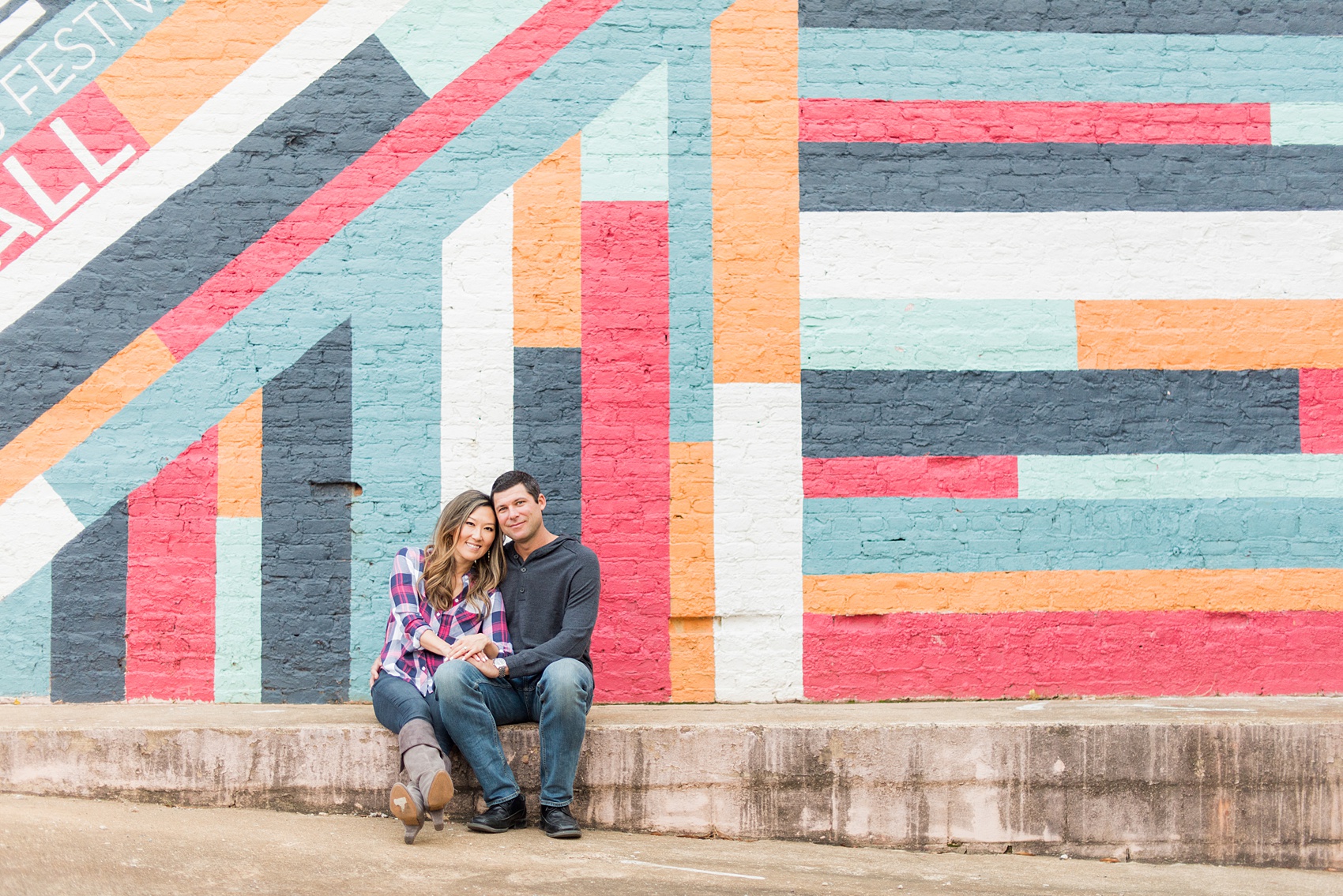 Colorful photos taken during a fall, autumn season engagement anniversary session. Images taken by Mikkel Paige Photography in an urban city setting. Click through to see more from this vibrant, unique photography session with lots of fun colors, street art murals and ideas for outfits!