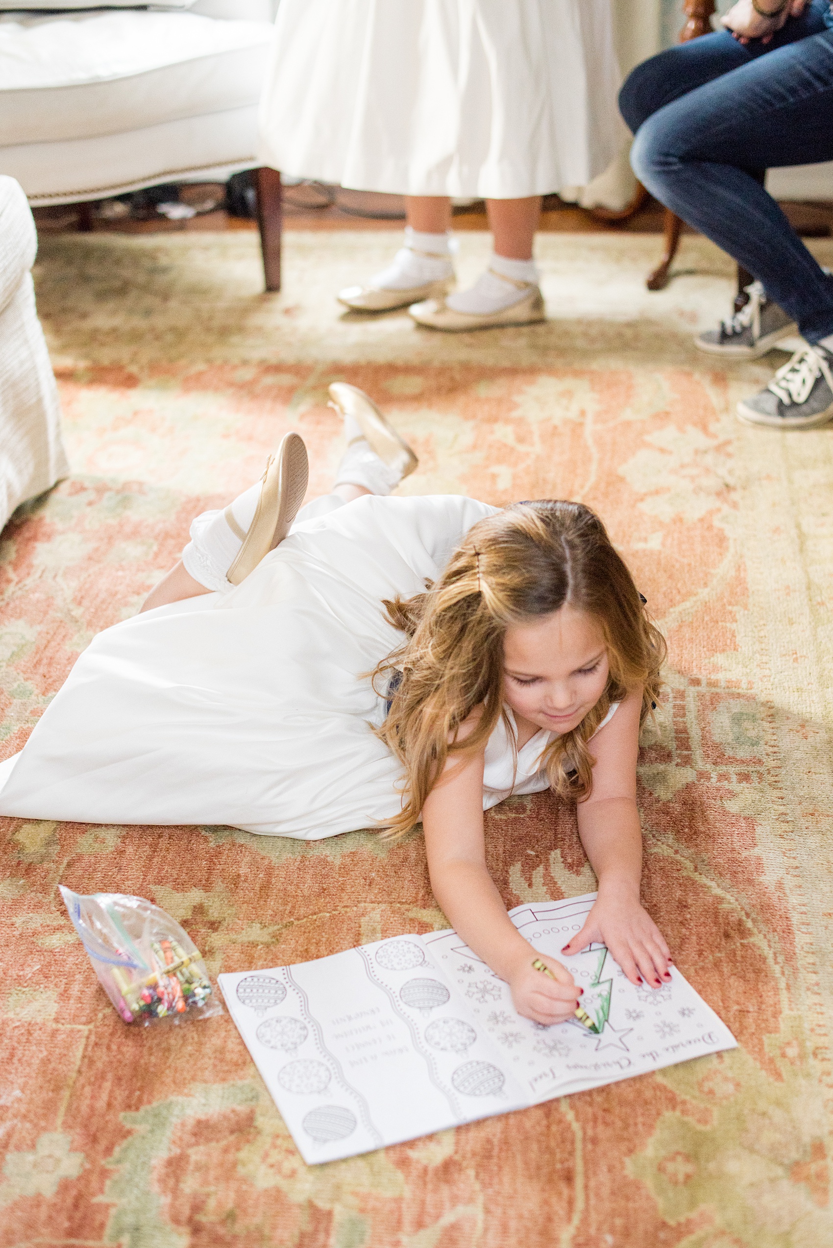 Beautiful wedding photos at The Carolina Inn at Chapel Hill, North Carolina by Mikkel Paige Photography. Photo of the flower girl during getting ready photos - click through to see the rest of this gorgeous winter wedding! #thecarolinainn