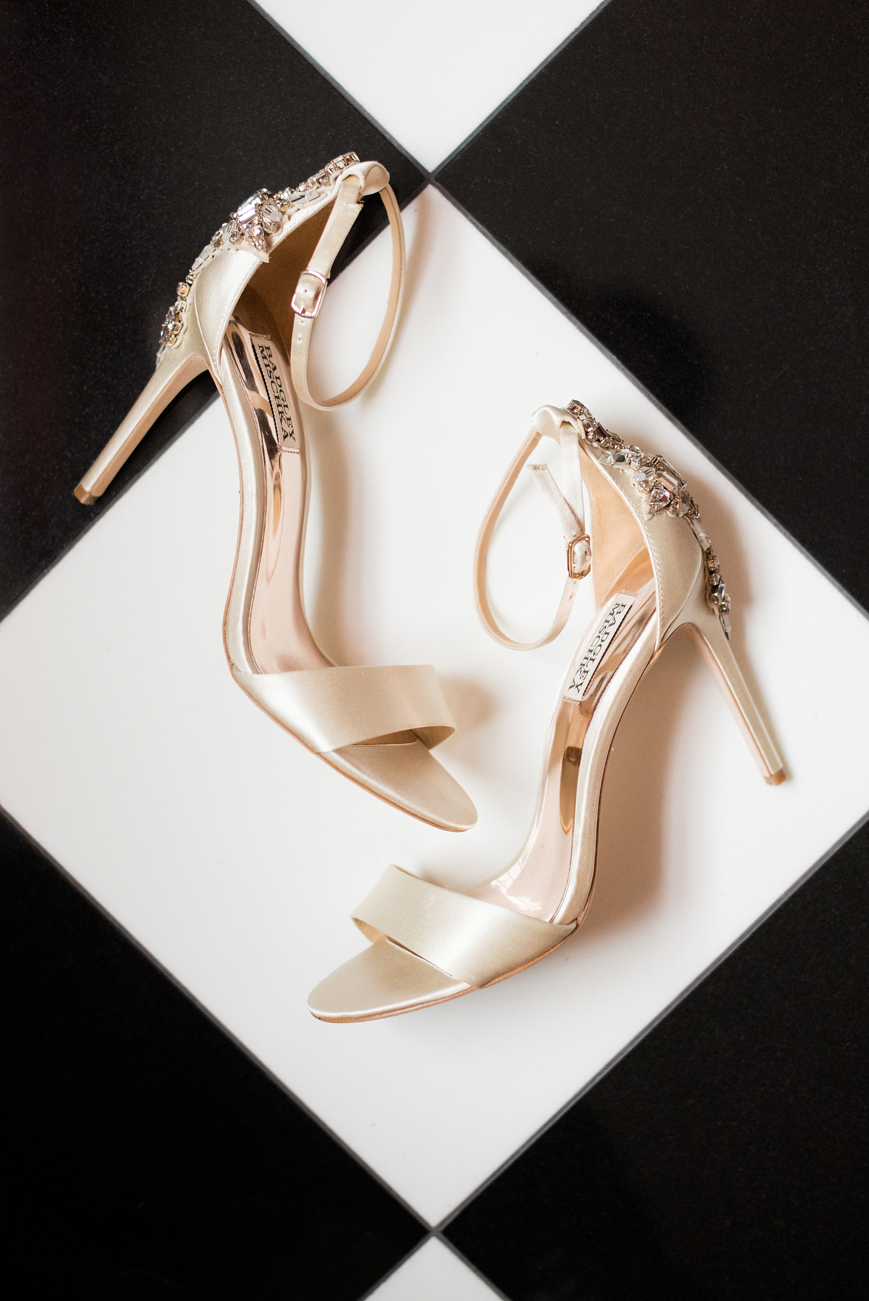 Beautiful wedding photos at The Carolina Inn at Chapel Hill, North Carolina by Mikkel Paige Photography. Detail photo of the bride's sparkly wedding shoe heels.