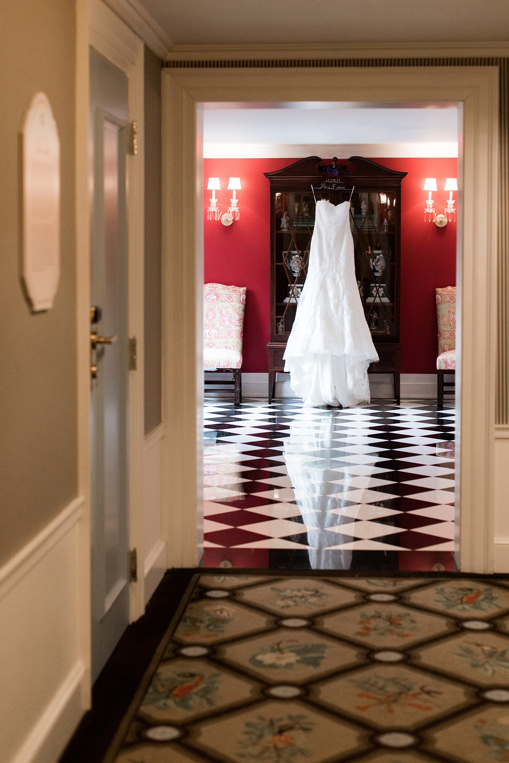 Beautiful wedding photos at The Carolina Inn at Chapel Hill, North Carolina by Mikkel Paige Photography. Photo of the bride's wedding gown - click through to see the rest of this gorgeous winter wedding! #thecarolinainn #winterwedding #snowywedding