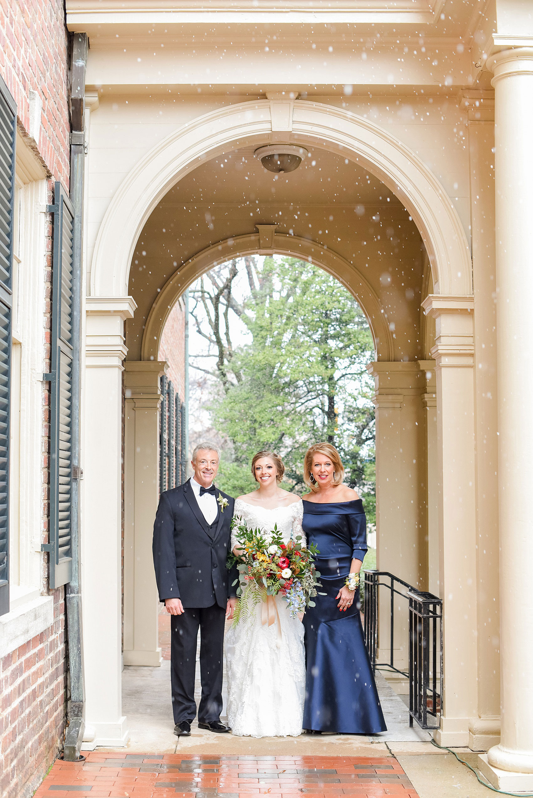 Beautiful wedding photos at The Carolina Inn at Chapel Hill, North Carolina by Mikkel Paige Photography. Photo of the bride with her parents at her wintery wedding. Click through to see the rest of this gorgeous winter wedding! #thecarolinainn #snowywedding