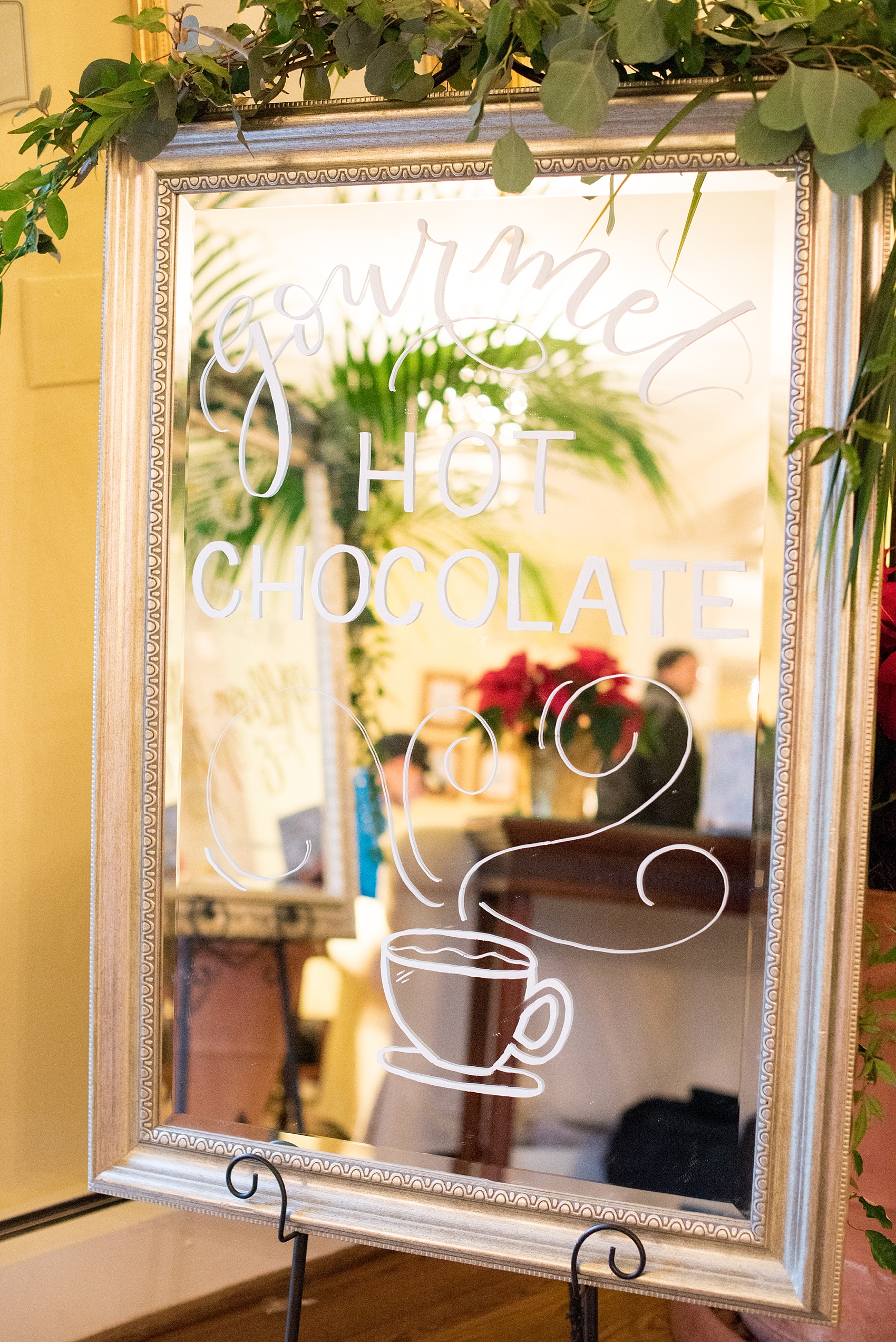 Beautiful wedding photos at The Carolina Inn at Chapel Hill, North Carolina by Mikkel Paige Photography. Mirror hot chocolate sign created by Mason Dixon Designs. Click through to see the rest of this gorgeous winter wedding! #thecarolinainn #snowywedding