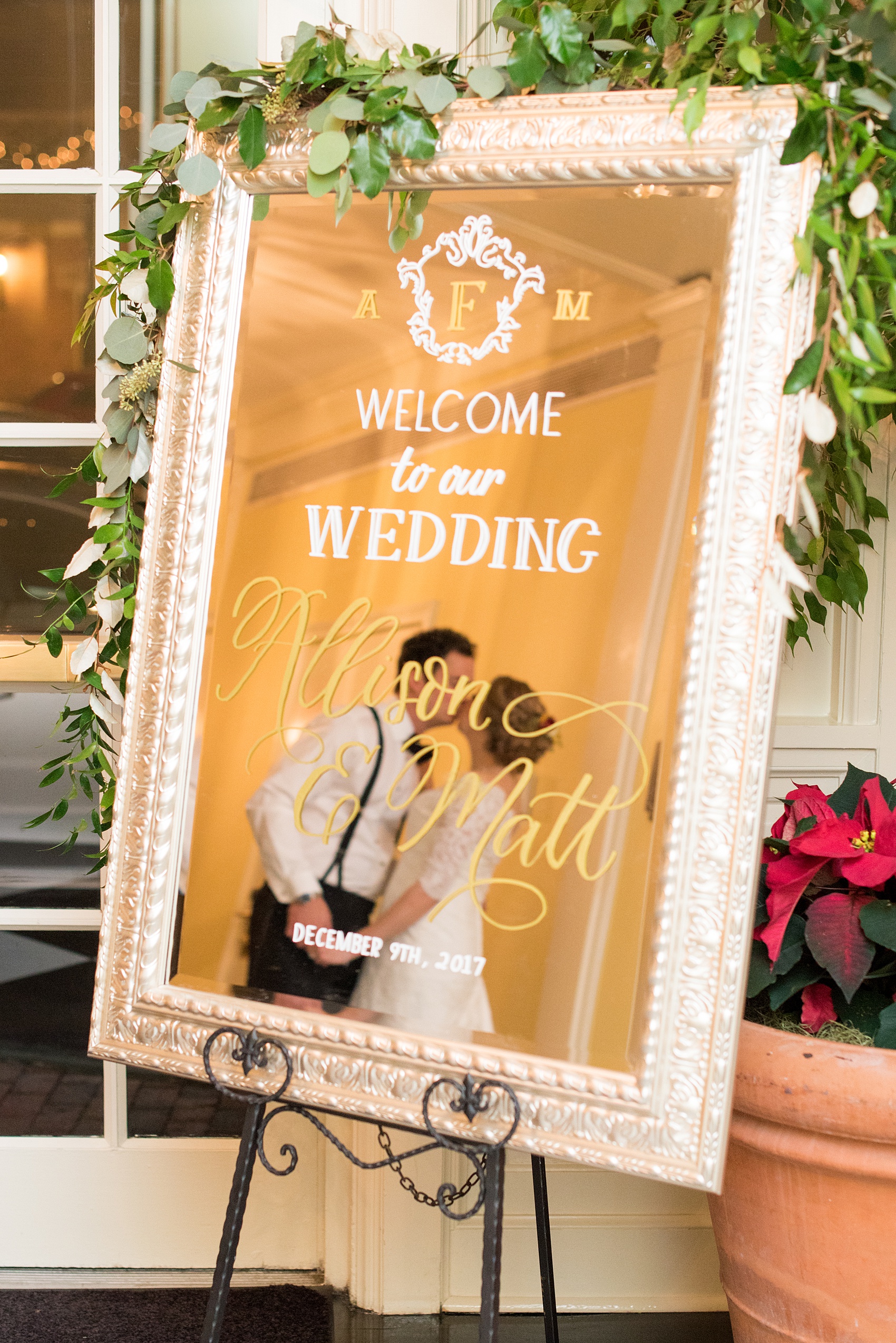 Beautiful wedding photos at The Carolina Inn at Chapel Hill, North Carolina by Mikkel Paige Photography. Picture of the welcome sign created with custom calligraphy on a framed mirror by Mason Dixon Designs. Click through to see the rest of this gorgeous winter wedding! #thecarolinainn #snowywedding