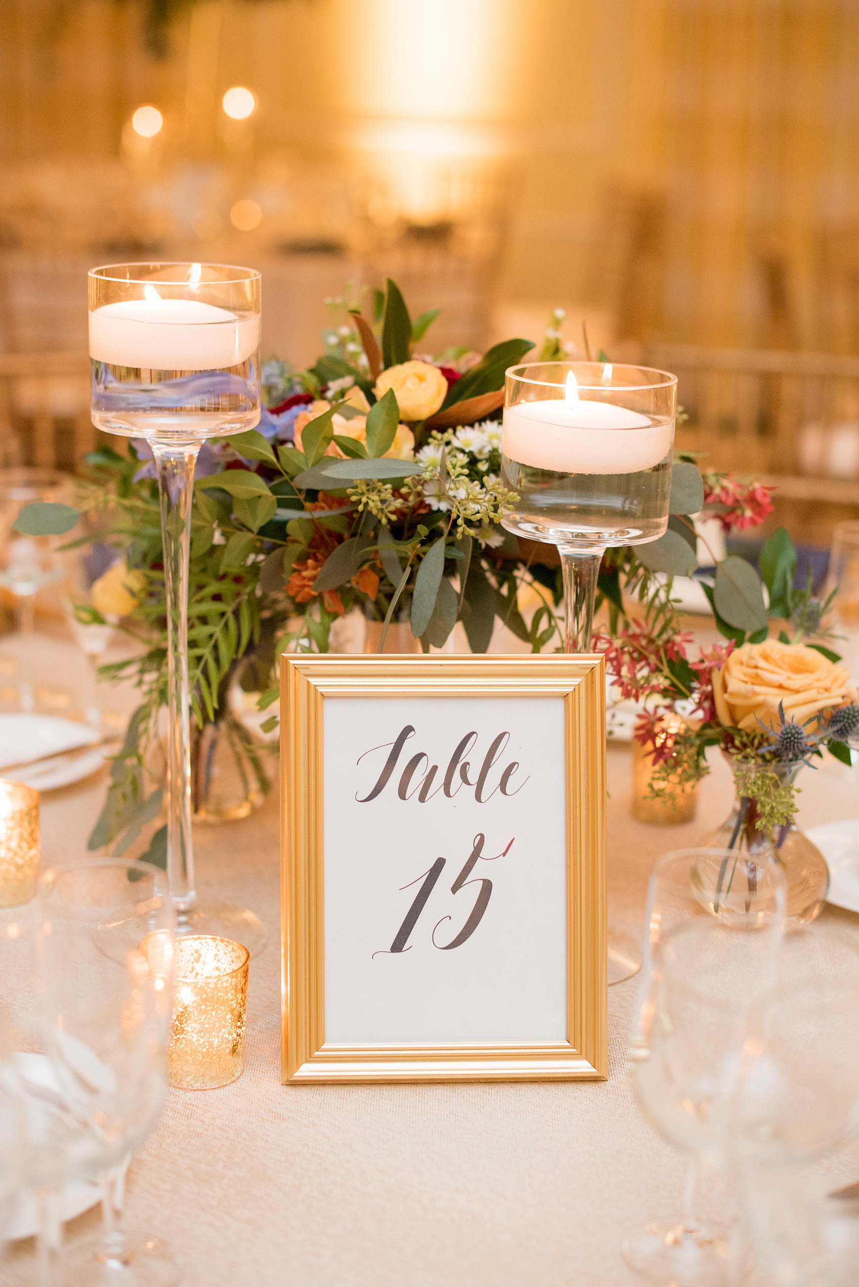 Beautiful wedding photos at The Carolina Inn at Chapel Hill, North Carolina by Mikkel Paige Photography. Picture of the table numbers, low floral centerpiece by English Garden and table number. Planning by McLean Events. Click through to see the rest of this gorgeous winter wedding! #thecarolinainn #snowywedding