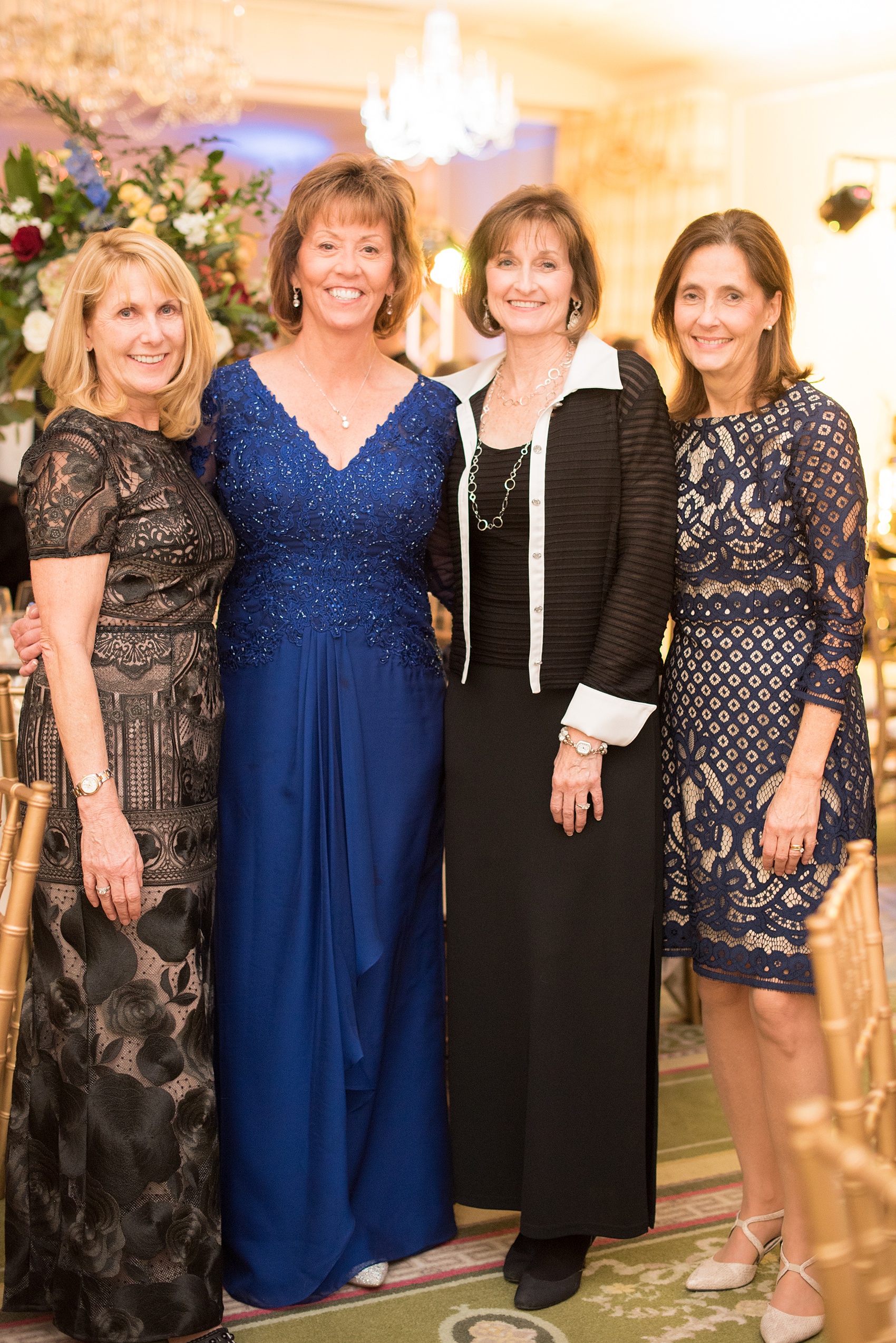 Beautiful wedding photos at The Carolina Inn at Chapel Hill, North Carolina by Mikkel Paige Photography. Picture of the groom's mother and friends at the reception. Click through to see the rest of this gorgeous winter wedding! #thecarolinainn #snowywedding