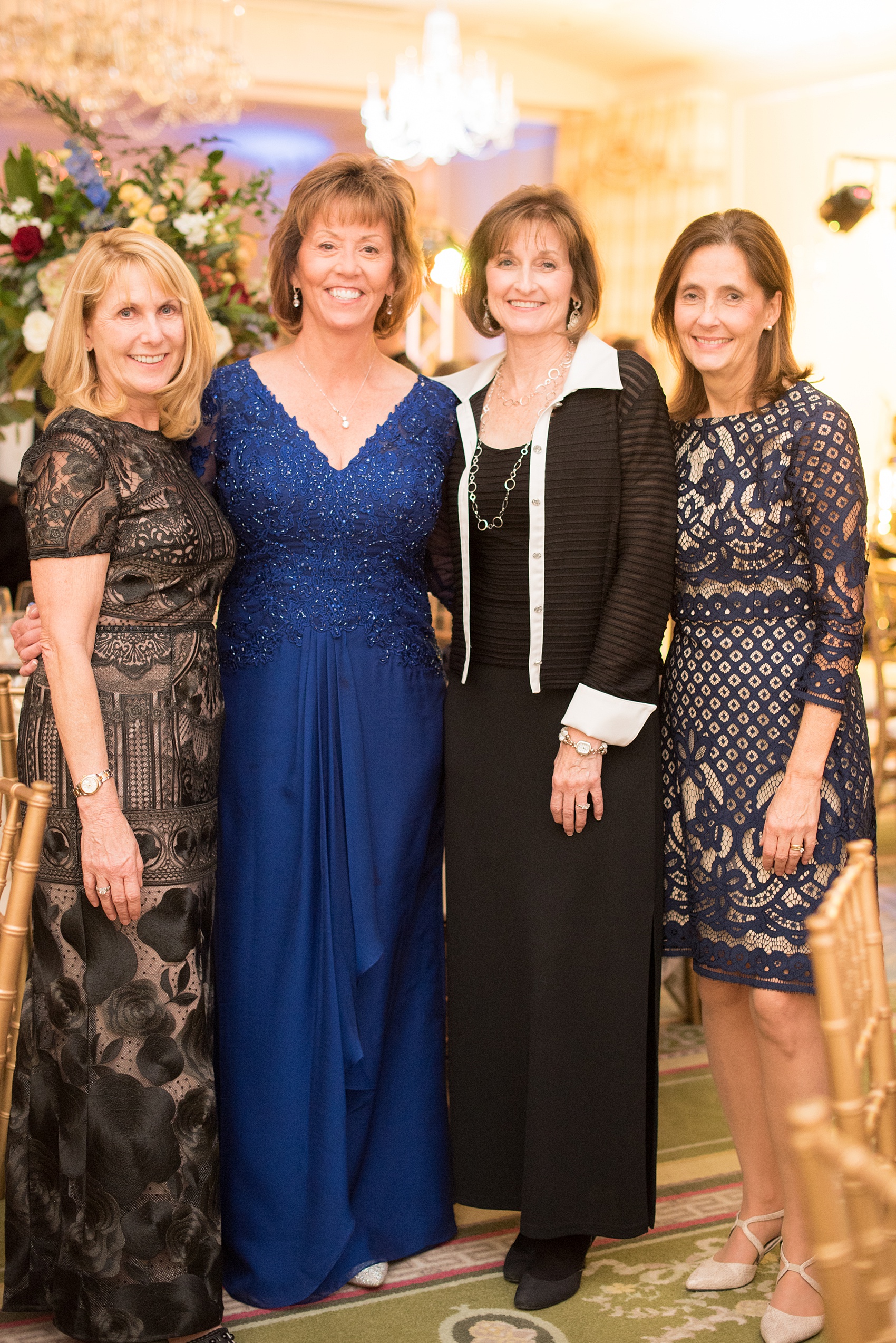Beautiful wedding photos at The Carolina Inn at Chapel Hill, North Carolina by Mikkel Paige Photography. Picture of the groom's mother and friends at the reception. Click through to see the rest of this gorgeous winter wedding! #thecarolinainn #snowywedding