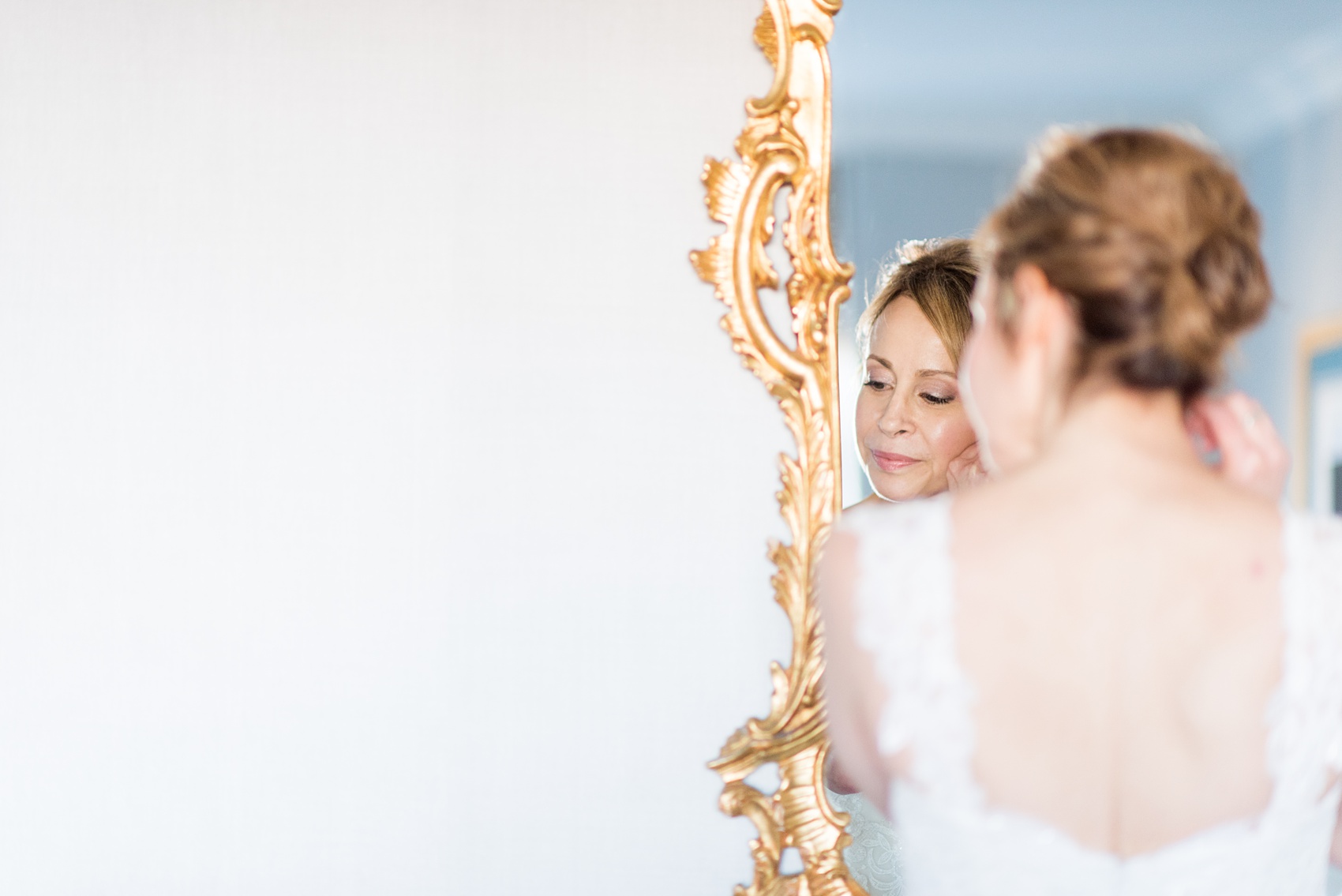 Photos by Mikkel Paige Photography of a Central Park Wedding ceremony and reception at the Loeb Boathouse venue with a romantic theme. The bride got ready at the nearby Park Lane Hotel in Manhattan. Click through for more images from her day! #CentralParkWedding