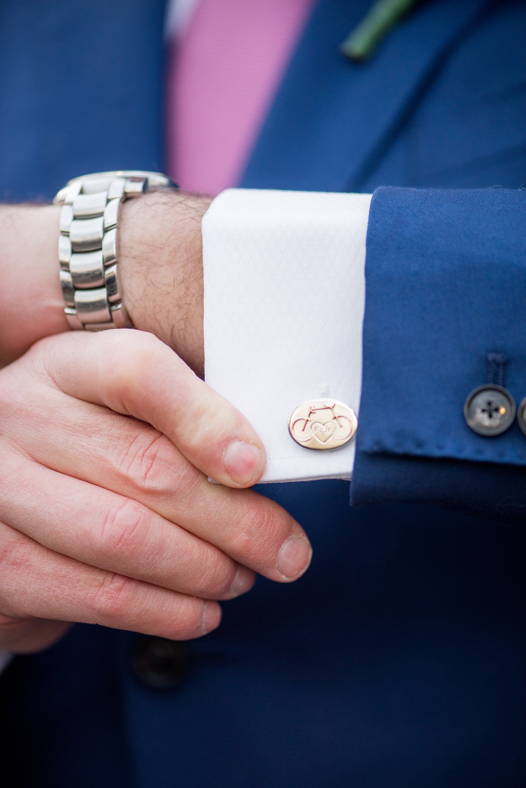 Photos by Mikkel Paige Photography of a Central Park Wedding ceremony and reception at the Loeb Boathouse venue with a romantic theme. Picture of the groom's custom wedding logo cufflinks for his winter wedding day. Click through for more images of their details! #CentralParkWedding