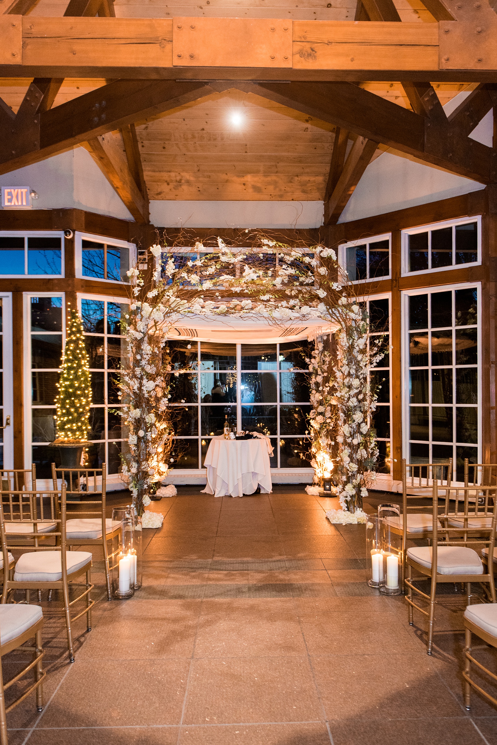 Photos by Mikkel Paige Photography of a Central Park Wedding reception at the Loeb Boathouse venue with a romantic theme. Detail image of the indoor, January winter inspired ceremony and chuppah. Click through for more images from this couple's beautiful day! #CentralParkWedding