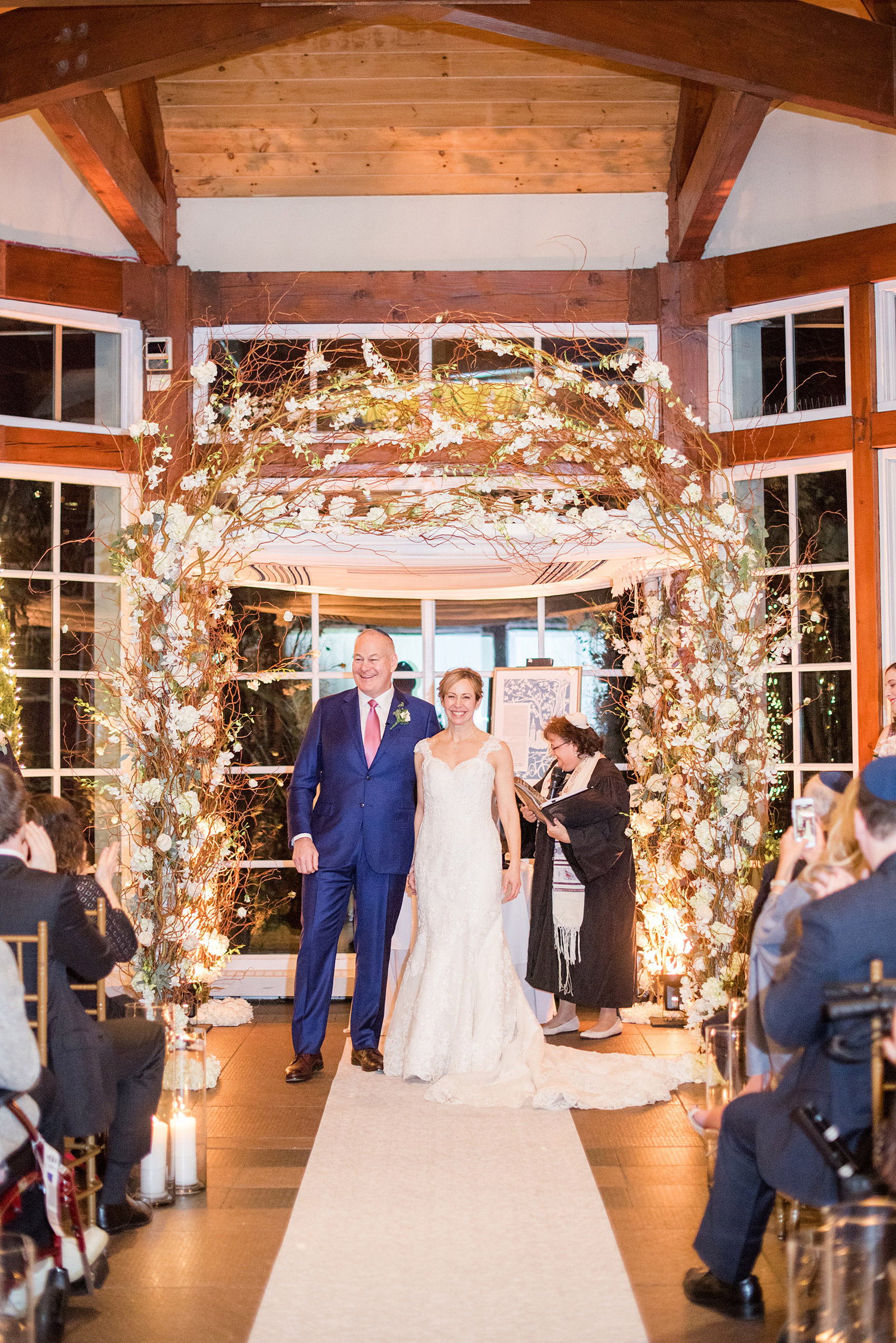 Photos by Mikkel Paige Photography of a Central Park Wedding reception at the Loeb Boathouse venue with a romantic theme. Detail image of the indoor, January winter inspired ceremony and chuppah. Click through for more images from this couple's beautiful day! #CentralParkWedding