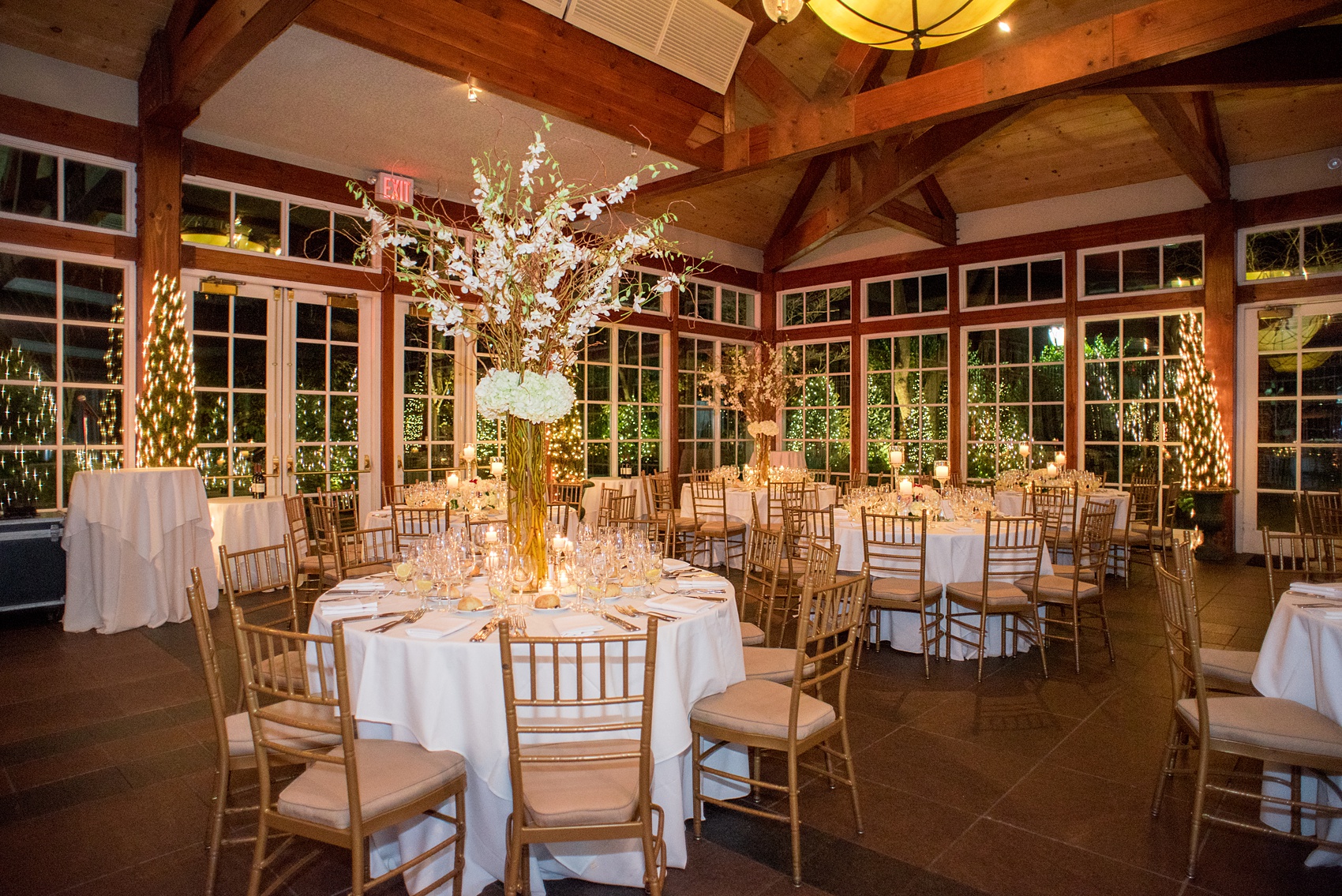 Photos by Mikkel Paige Photography of a Central Park Wedding ceremony and reception at the Loeb Boathouse venue with a romantic theme. Picture of the winter white inspired party with candlelight. Click through for more images from the day! #CentralParkWedding