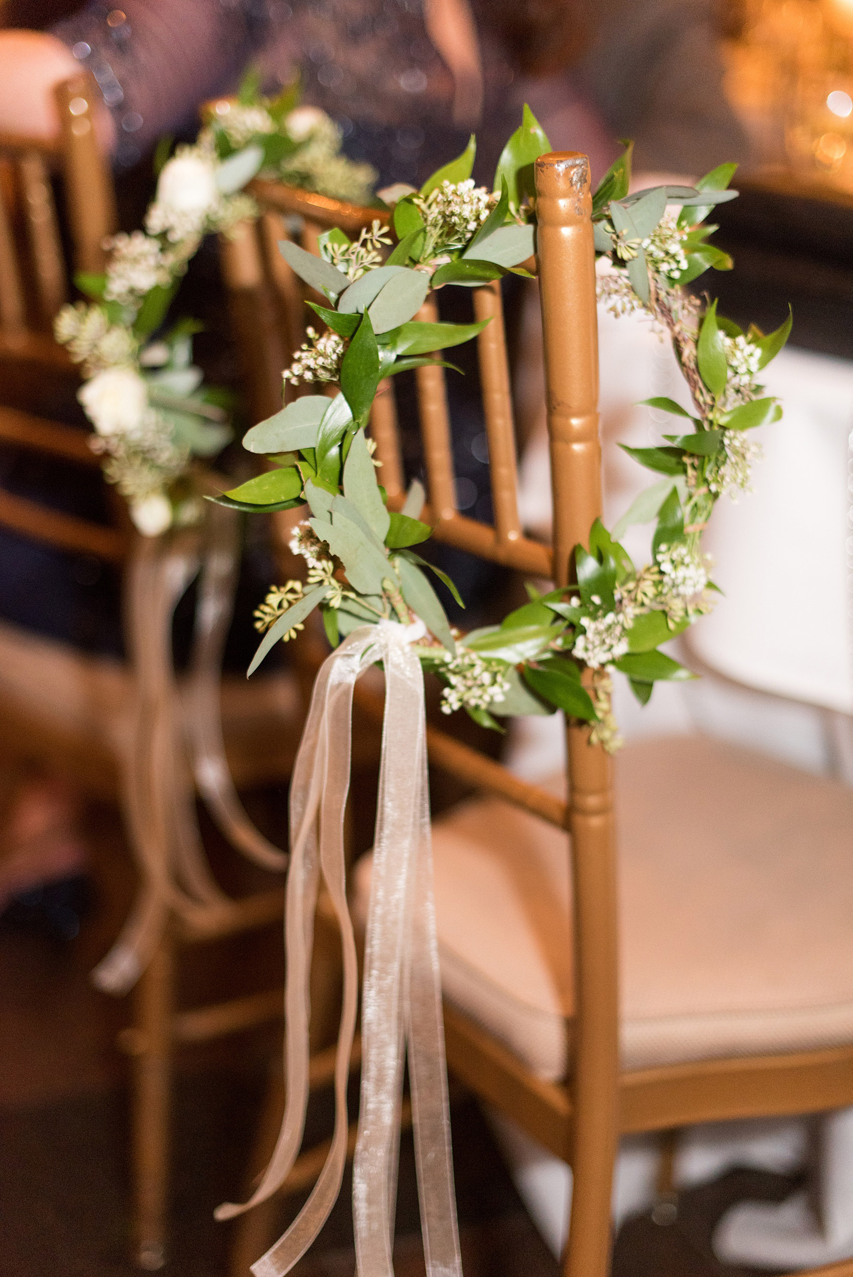 Photos by Mikkel Paige Photography of a Central Park Wedding reception at the Loeb Boathouse venue with a romantic winter theme. Picture of the Jewish tradition mizinke flower crowns. Click through for more images from this beautiful day! #CentralParkWedding