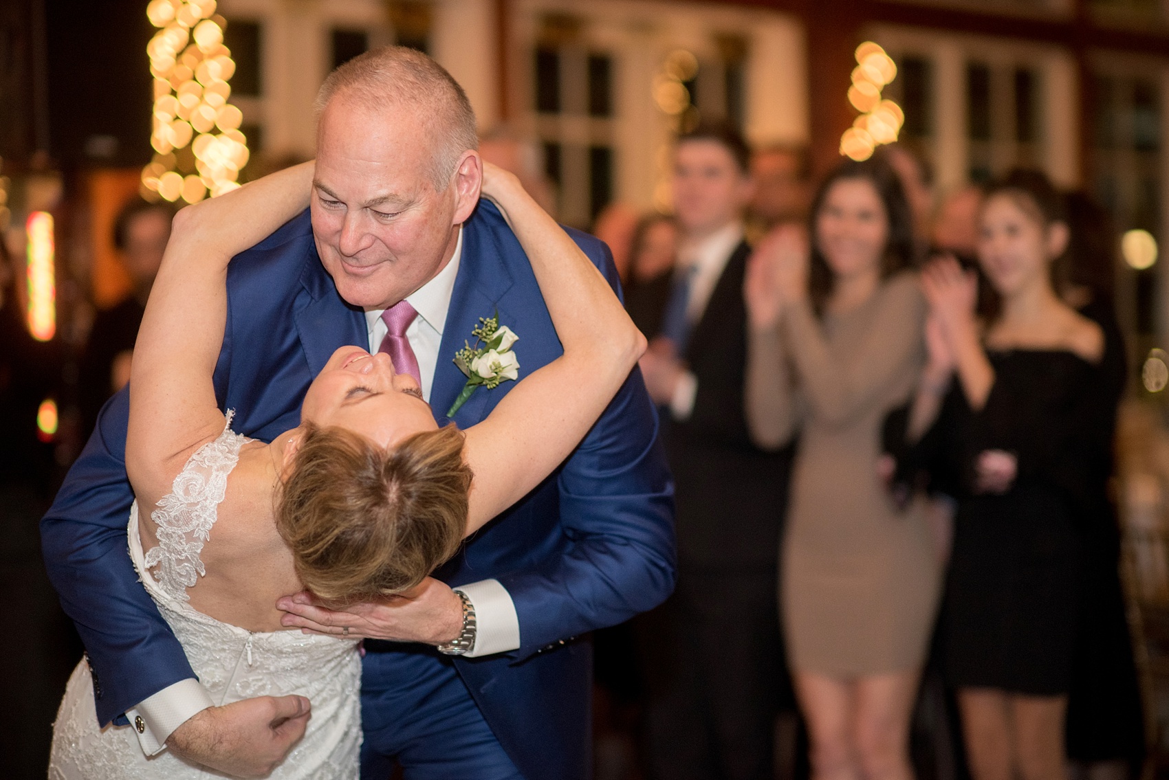 Photos by Mikkel Paige Photography of a Central Park Wedding reception at the Loeb Boathouse venue with a romantic winter theme. Picture of the bride and groom's first dance. Click through for more images from this beautiful day! #CentralParkWedding