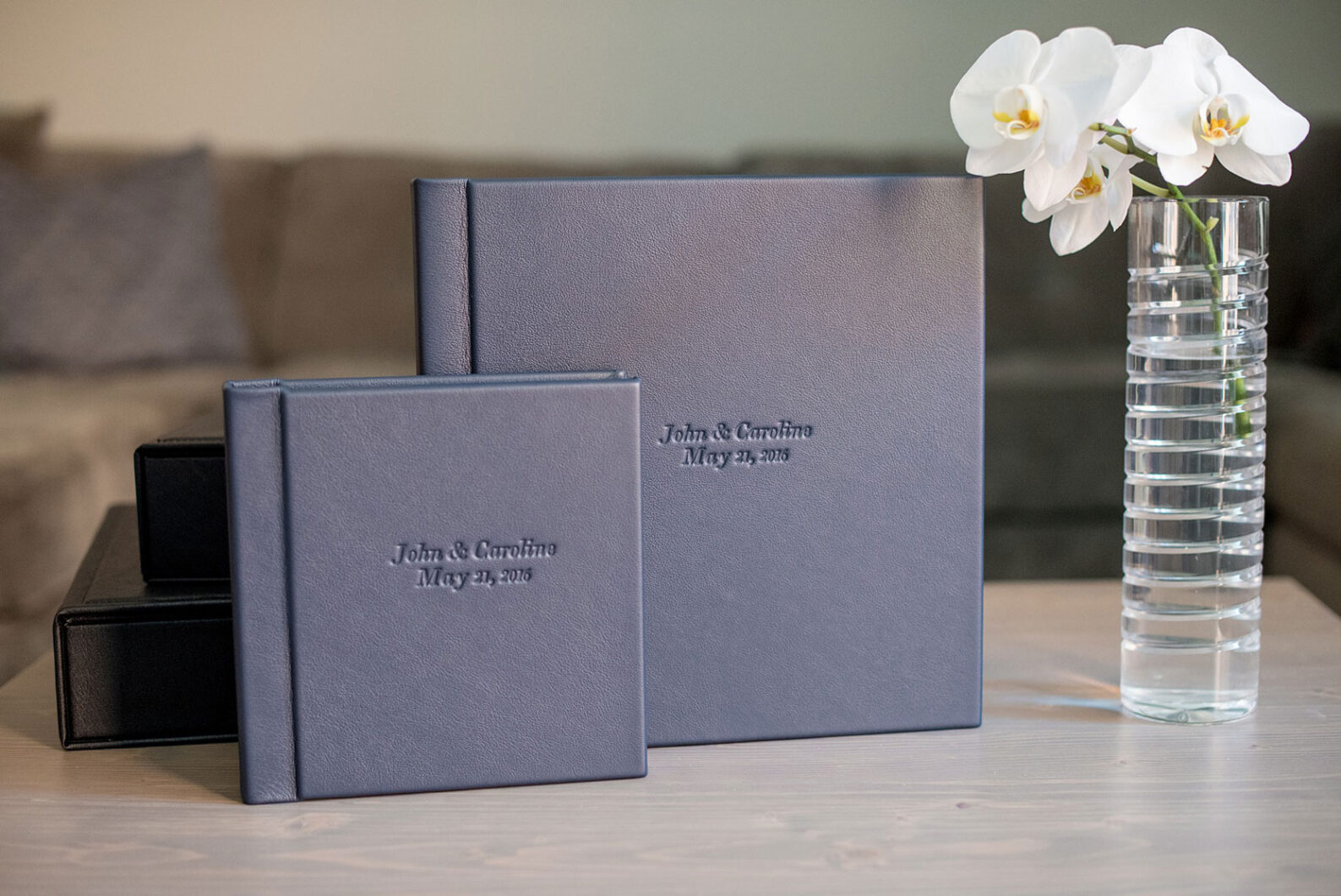 Images of a fine art leather wedding album in navy blue from Mikkel Paige Photography, a Raleigh, NC photographer.