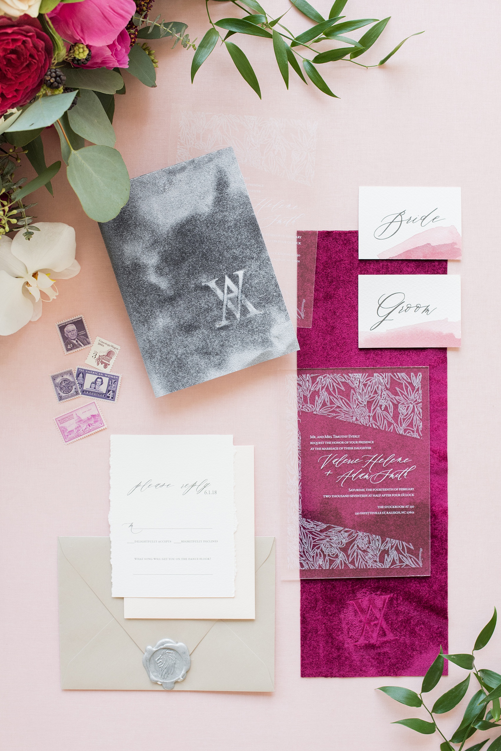 Photos from a wedding in downtown Raleigh, NC by Mikkel Paige Photography. The Stockroom at 230 and The Glass Box on historic Fayetteville Street served as the venue for this romantic inspiration shoot. The stationery by One and Only Paper had see-through acrylic elements and white font, with embossed velvet, calligraphy and vintage stamps.