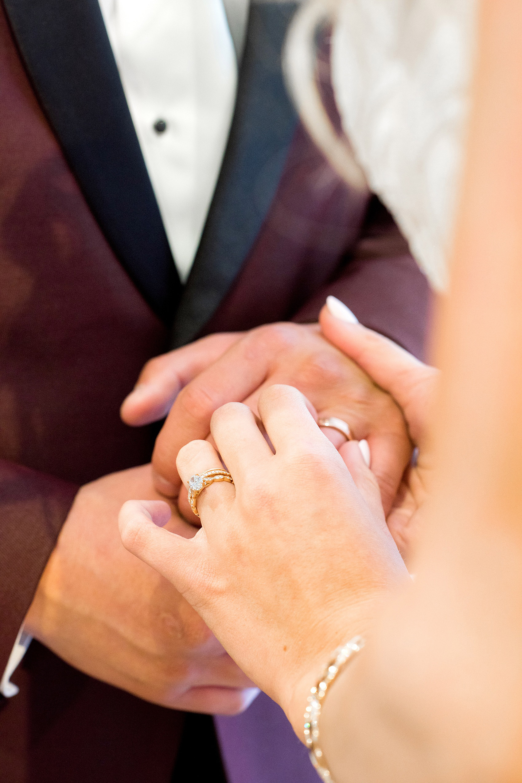 Photos from a wedding in downtown Raleigh, NC by Mikkel Paige Photography. The ceremony was held inside the historic venue, The Stockroom at 230. The bride and groom exchanged rose gold rings from Bailey's jewelry store.