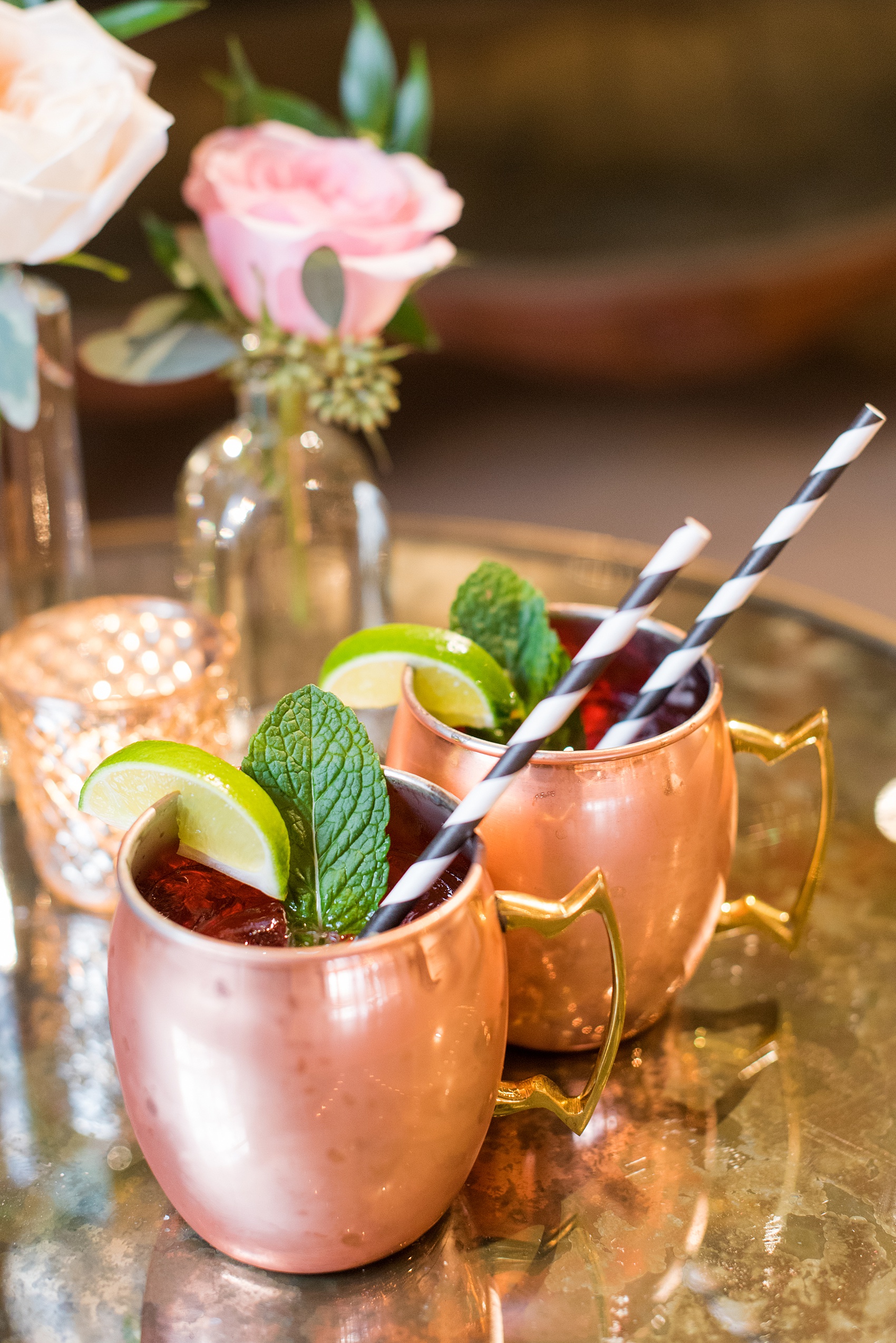 Photos from a wedding in downtown Raleigh, NC by Mikkel Paige Photography. The reception was held inside the historic venue, The Stockroom at 230. The signature cocktail by On the Rocks bartending was a Love on the Rocks.