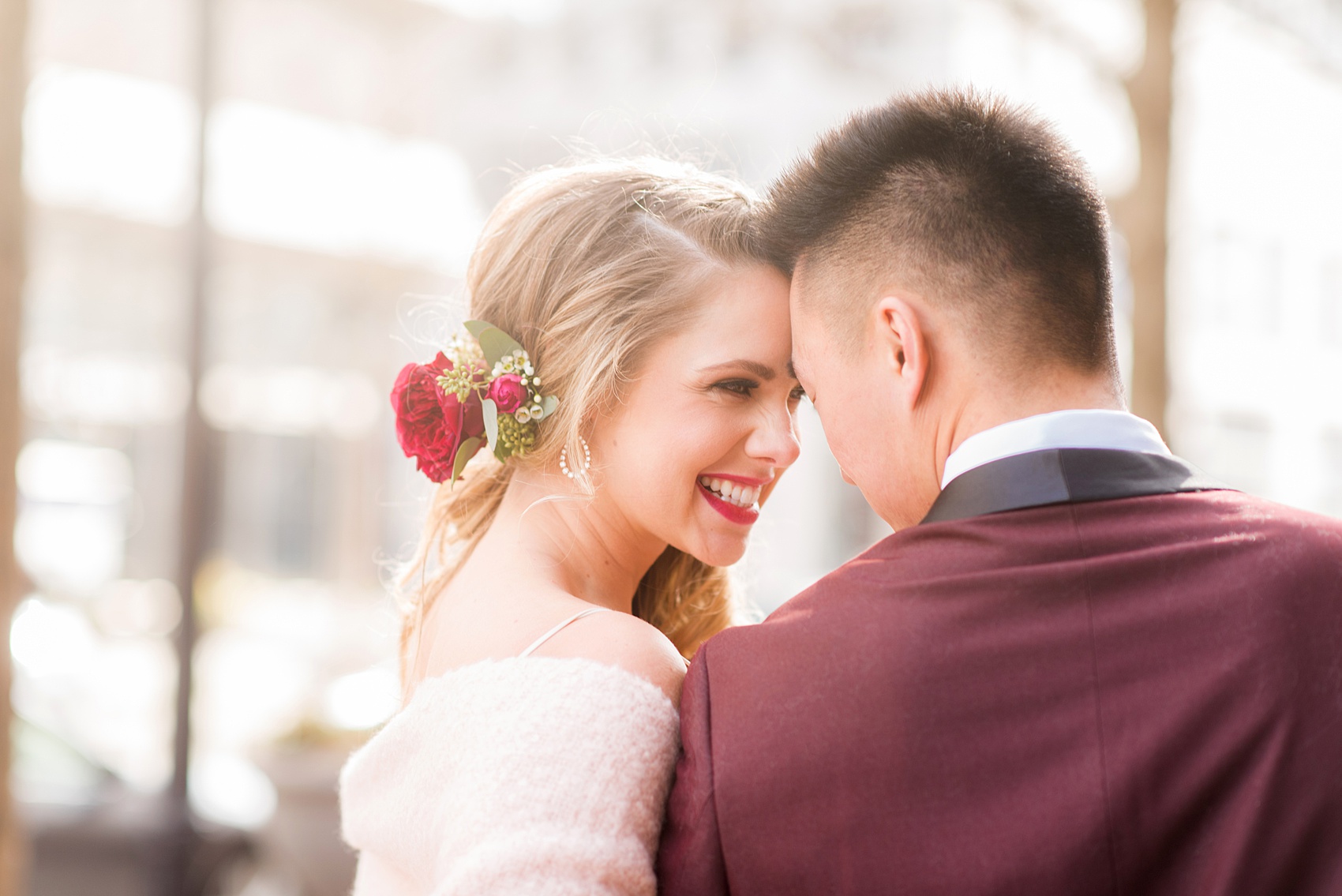 Photos from a wedding in downtown Raleigh, NC by Mikkel Paige Photography. The bride and groom enjoyed a February, Valentine's Day inspired wedding at The Stockroom at 230 and The Glass Box on historic Fayetteville Street.