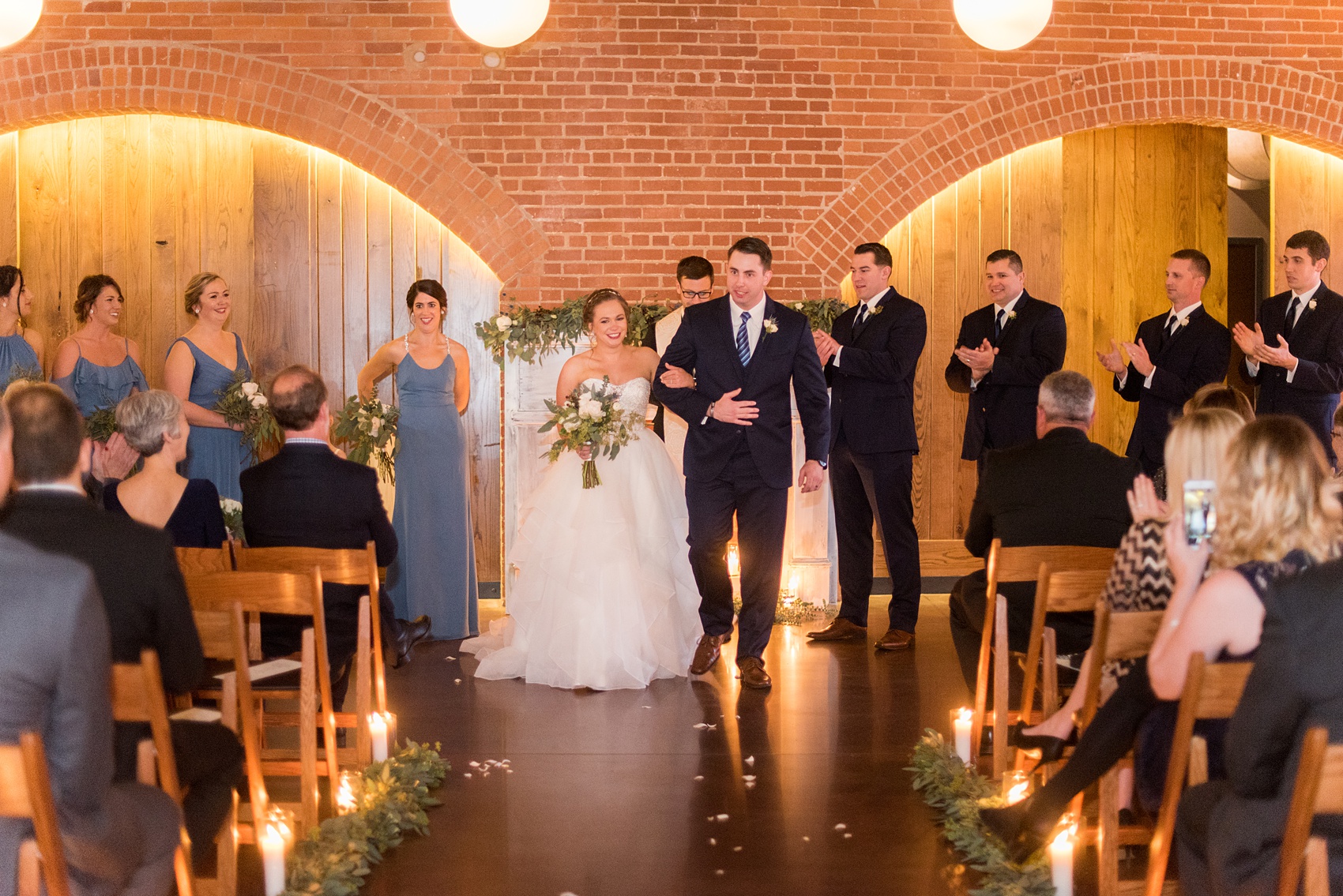 Durham wedding photos at The Cookery by Mikkel Paige Photography in North Carolina. The bride and groom got married in a romantic indoor ceremony during their winter wedding.