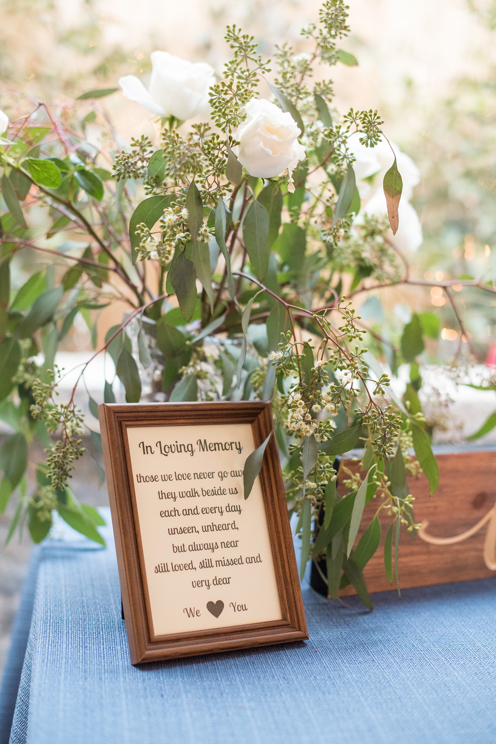 Durham wedding photos at The Cookery by Mikkel Paige Photography in North Carolina. The couple had a memory table with flowers and a framed prayer.