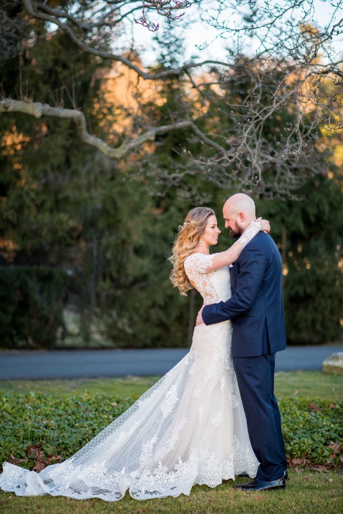 Wedding photos at Sleepy Hollow Country Club for a winter reception in January by Mikkel Paige Photography. A picture of the bride looking into her new husband's eyes during their New York celebration.