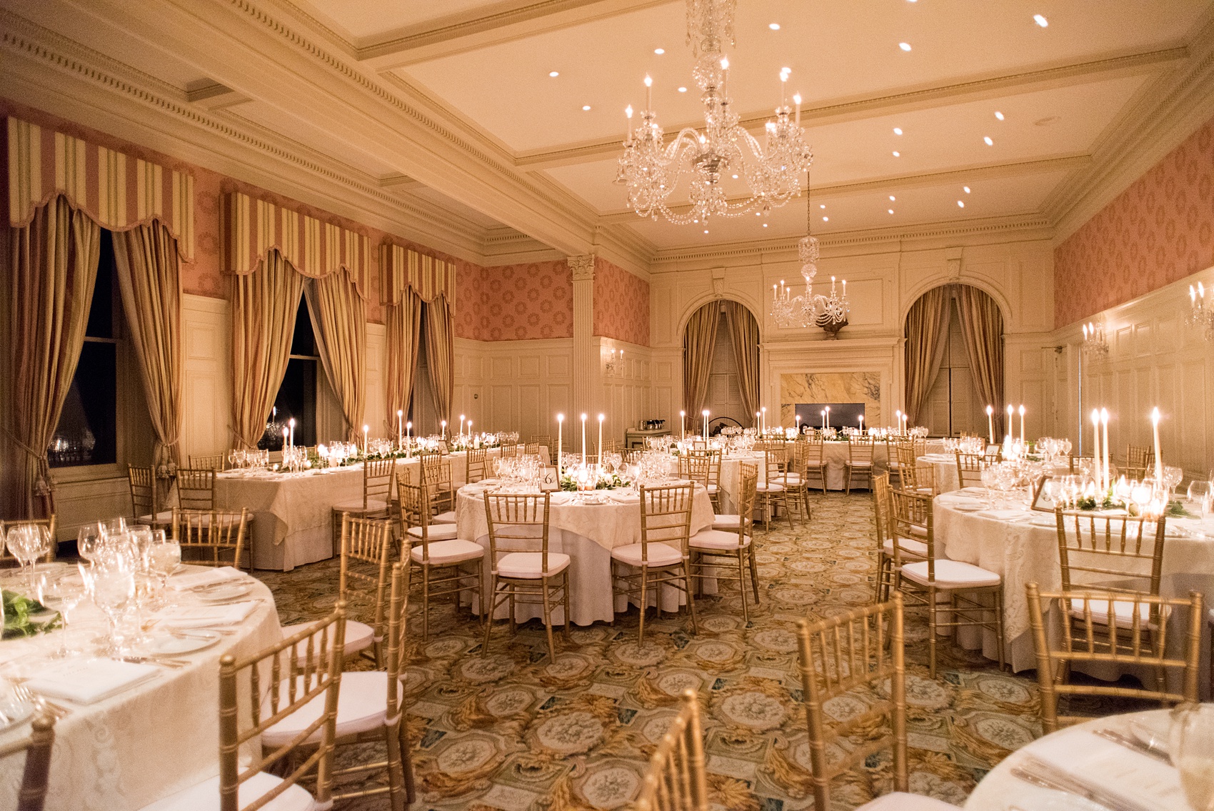 Wedding photos at Sleepy Hollow Country Club for a winter reception in January by Mikkel Paige Photography. Their ornate, European inspired New York winter wedding venue was decorated with gold and white accents.