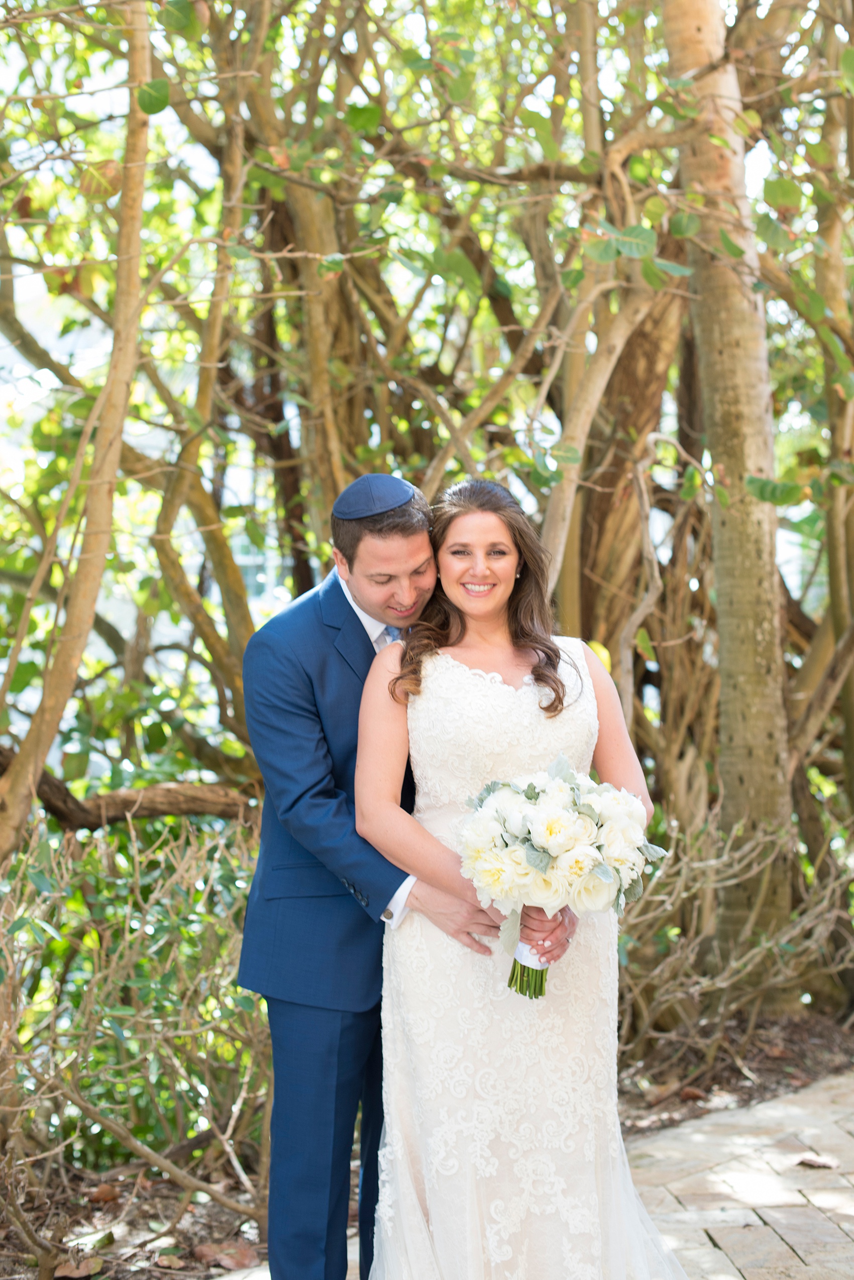 Wedding photos at Eau Palm Beach by Mikkel Paige Photography. Pictures right next to the ocean for a destination wedding.