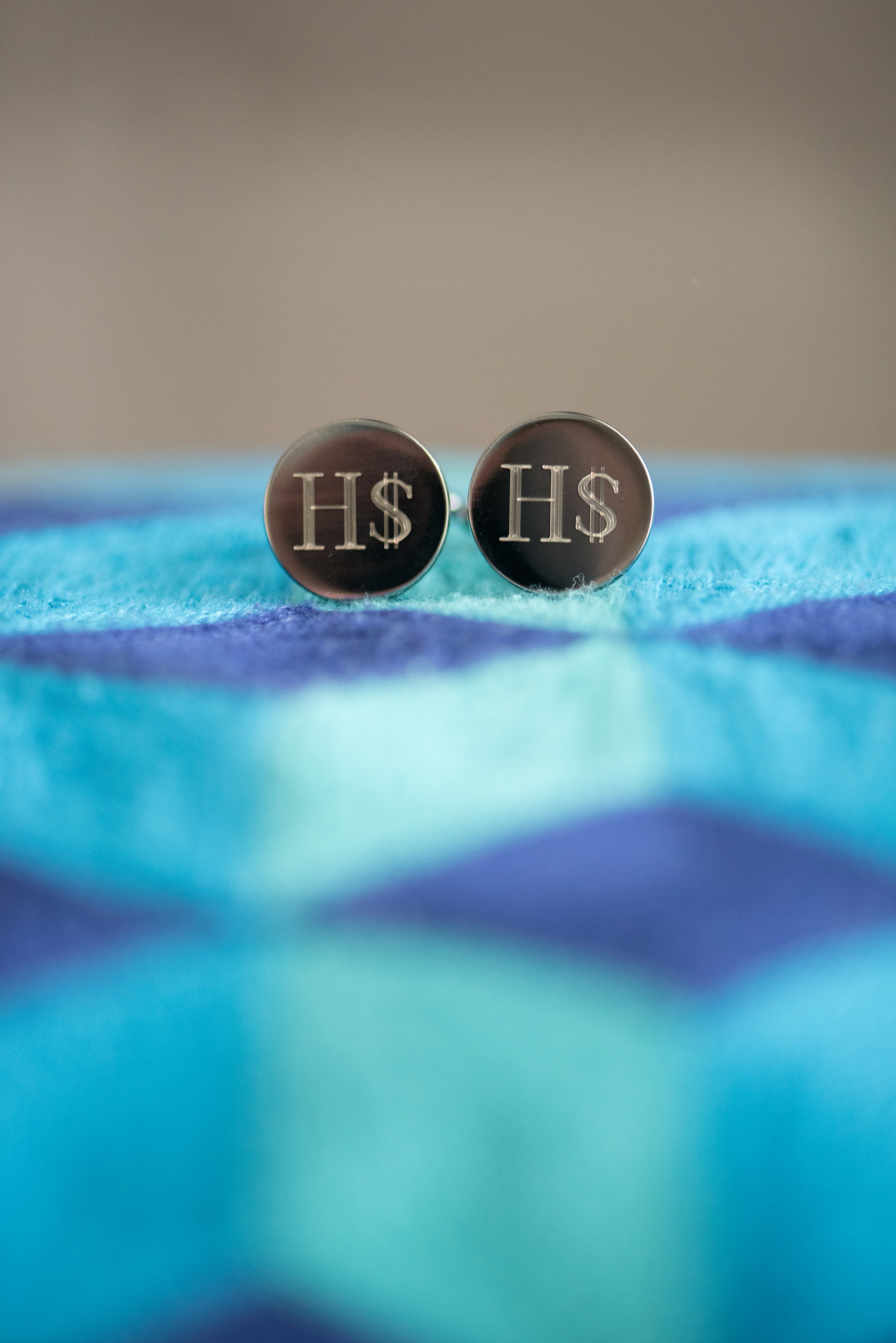 Photos from a wedding at Eau Palm Beach resort in Florida by Mikkel Paige Photography. This spa is also a beautiful destination for luxury weddings. The groom wore custom gunmetal cufflinks from his bride for a unique detail of their day. #Cufflinks #Groomdetails #Groom #weddingday #EauPalmBeach #FloridaWeddings