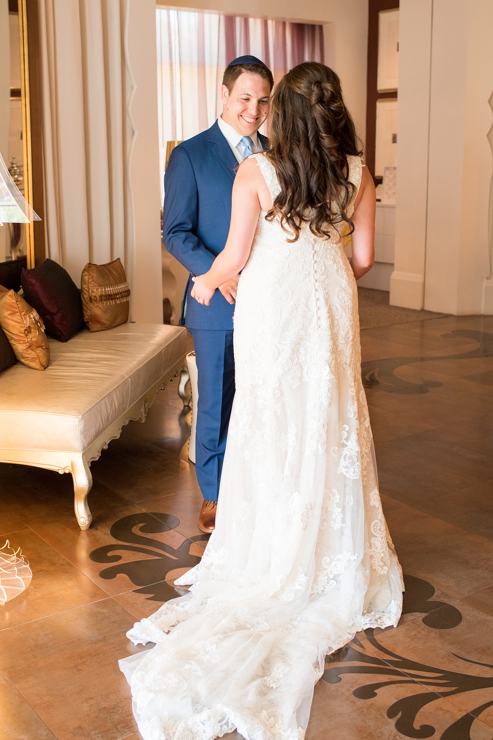 Eau Palm Beach wedding photos by Mikkel Paige Photography. This luxury Florida resort is a beautiful location for a destination wedding. The bride and groom shared a beautiful first look. #WestPalmBeach #EauPalmBeach #BeachWedding #FloridaWeddings #BeachBride #firstlook