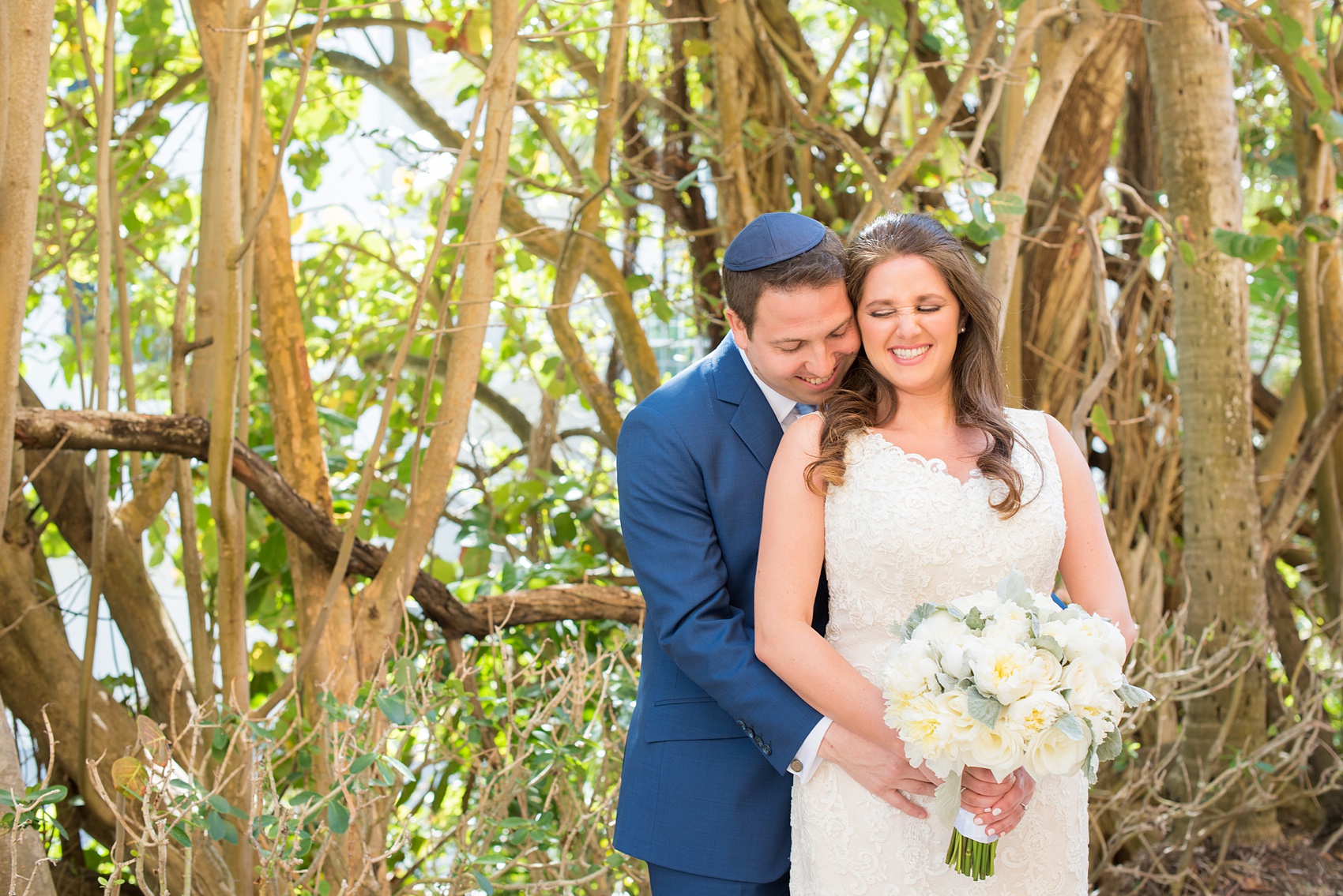 Eau Palm Beach wedding photos by Mikkel Paige Photography. This luxury Florida hotel is a beautiful location for a destination wedding. The bride and groom took pictures around the resort before their ceremony. Click through to see more! #WestPalmBeach #EauPalmBeach #BeachWedding #FloridaWeddings #BeachBride