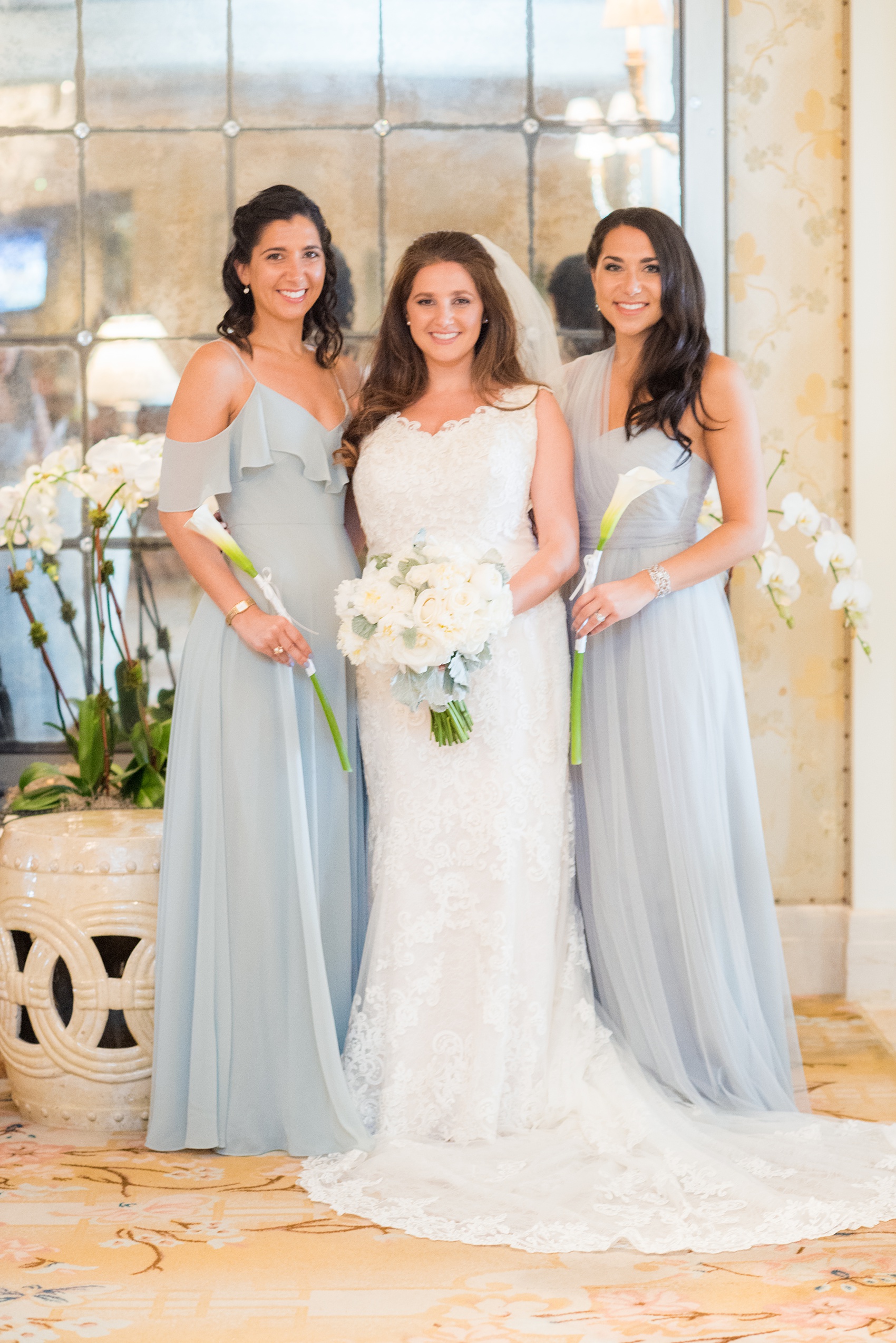 Eau Palm Beach wedding photos by destination photographer, Mikkel Paige. This luxury Florida hotel is a beautiful location for a destination wedding. The bridesmaids wore different types of seafoam/mint green chiffon gowns. Click through to see more! #WestPalmBeach #EauPalmBeach #BeachWedding #FloridaWeddings #BeachBride