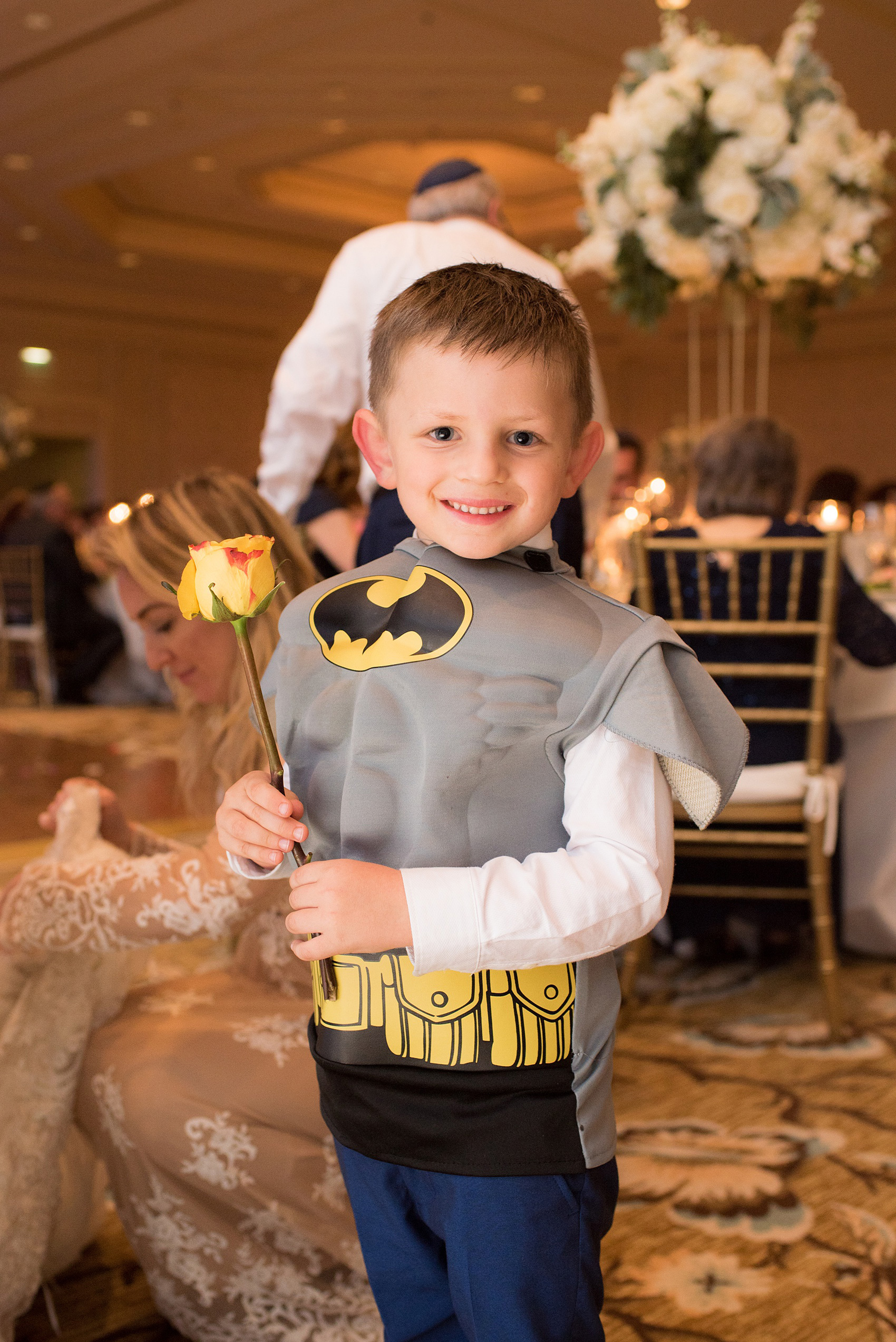 Eau Palm Beach wedding photos by destination photographer, Mikkel Paige. This luxury West Palm Beach, Florida hotel is a beautiful location for a destination wedding. The bride and groom's nephew and ring bearer dressed as Batman during dancing of the reception! Click through to see more! #WestPalmBeach #EauPalmBeach #BeachWedding #FloridaWeddings #Batman