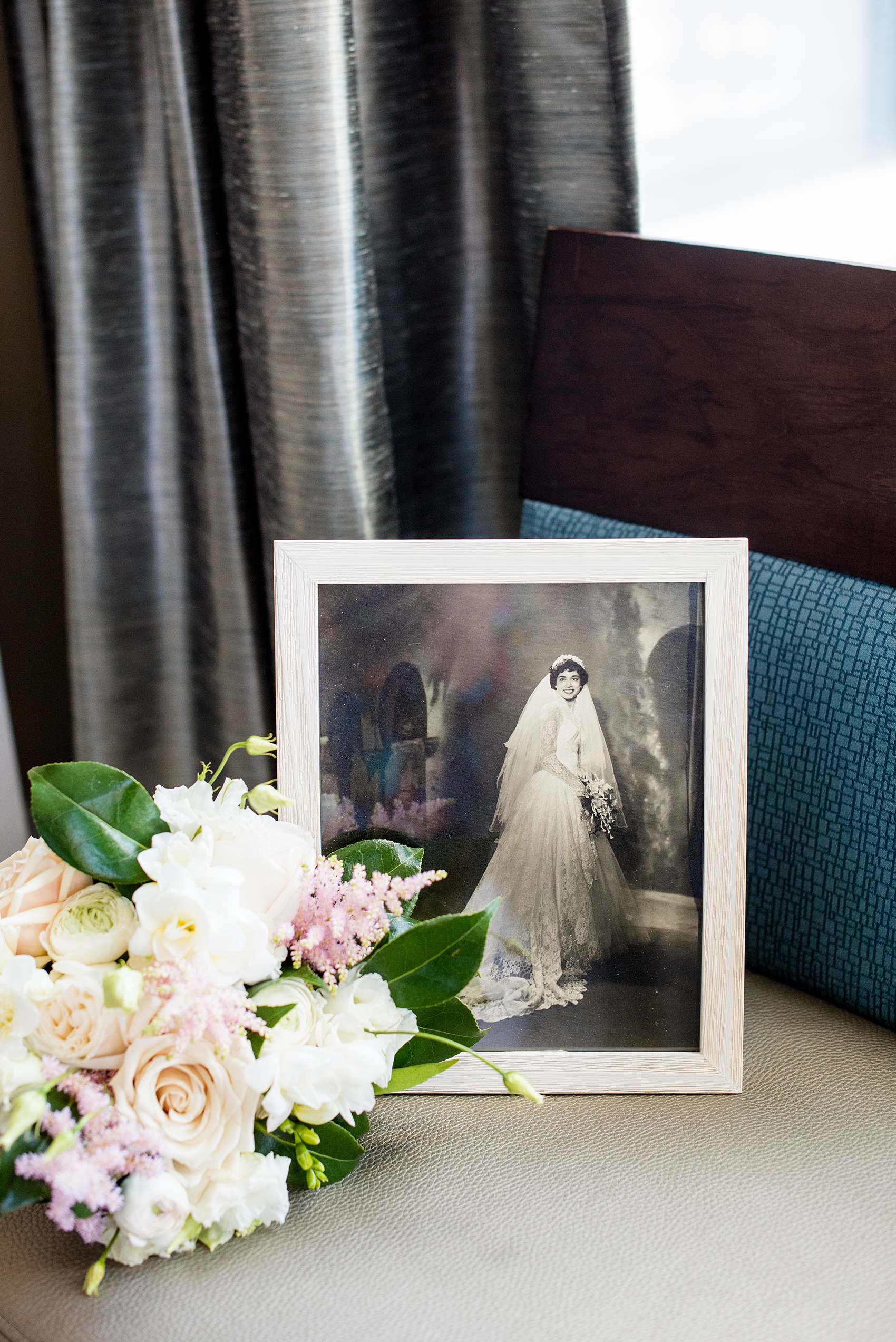 Saratoga Springs destination wedding photos by Mikkel Paige Photography. The bride brought a photo of her grandmother to keep close by as she got ready for the day at the Pavilion Grand hotel. #SaratogaSpringsNY #SaratogaSprings #mikkelpaige #NYwedding #destinationwedding 