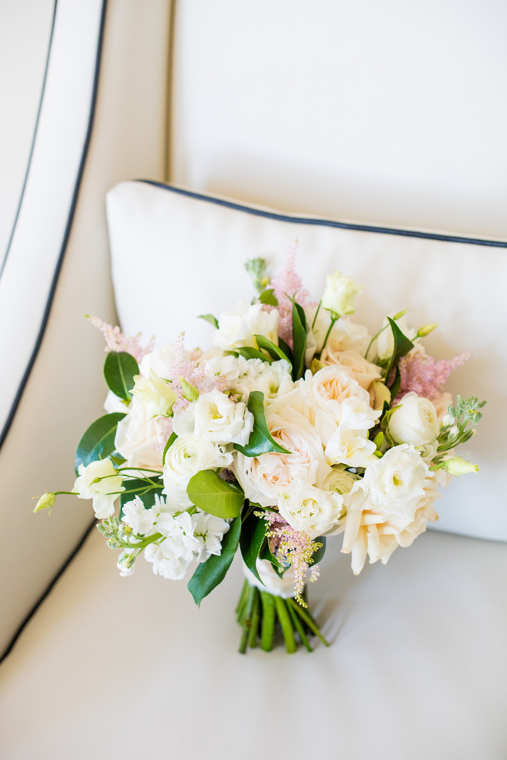 Saratoga Springs destination wedding photos by Mikkel Paige Photography. The carried a bouquet of white roses and lisianthus, ranunculus and pink astilbe for her April spring wedding. #SaratogaSpringsNY #SaratogaSprings #mikkelpaige #NYwedding #destinationwedding 