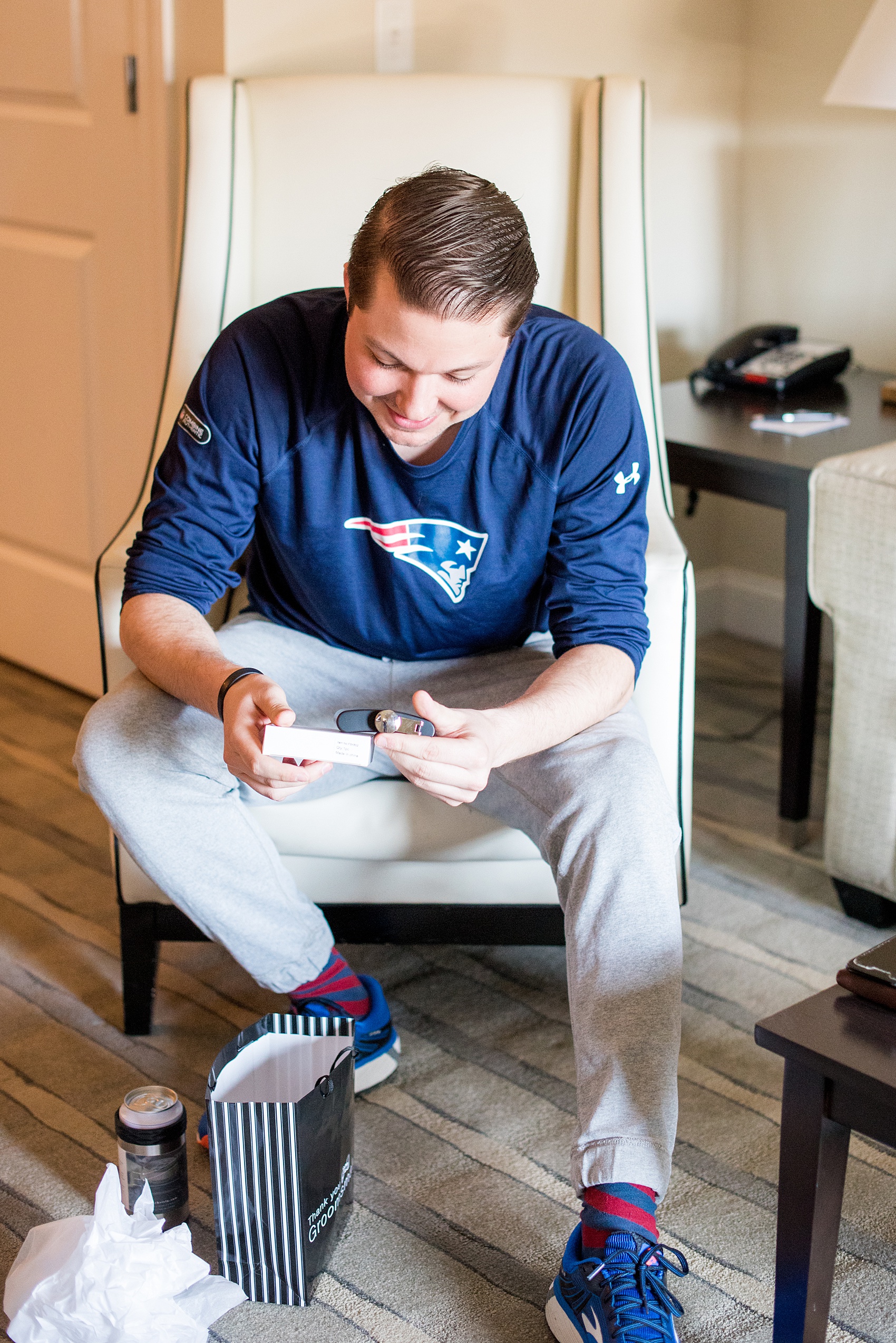 Saratoga Springs destination wedding photos by Mikkel Paige Photography. The groomsmen got ready at the Pavilion Grand hotel downtown. The groom got his groomsmen custom flasks, Corksicle can holders, green bow ties and Tie Bar socks, and whiskey for his April spring wedding. #SaratogaSpringsNY #SaratogaSprings #mikkelpaige #NYwedding #destinationwedding 