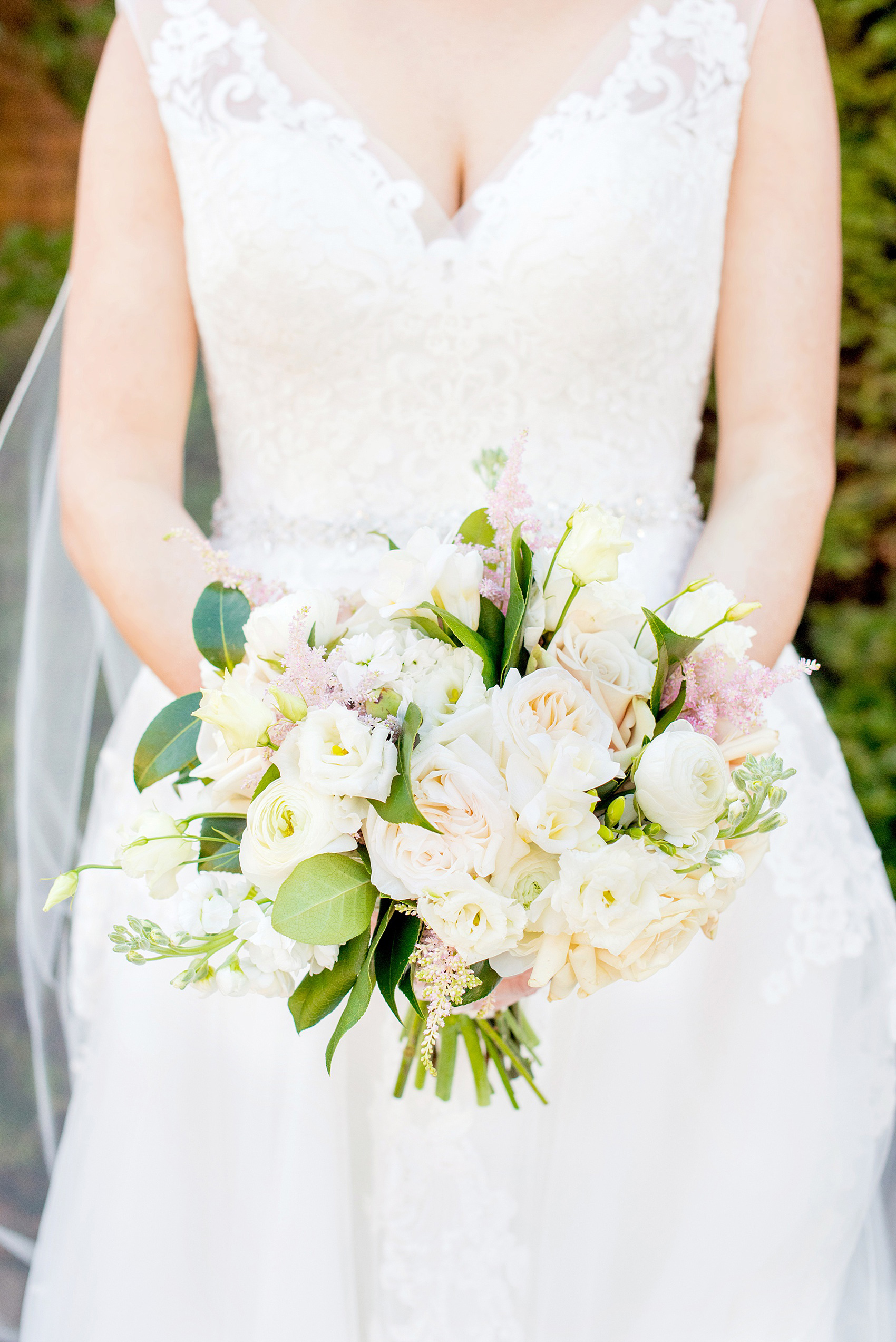 Saratoga Springs destination wedding photos by Mikkel Paige Photography. The carried a bouquet of white roses and lisianthus, ranunculus and pink astilbe for her April spring wedding. #SaratogaSpringsNY #SaratogaSprings #mikkelpaige #NYwedding #destinationwedding 