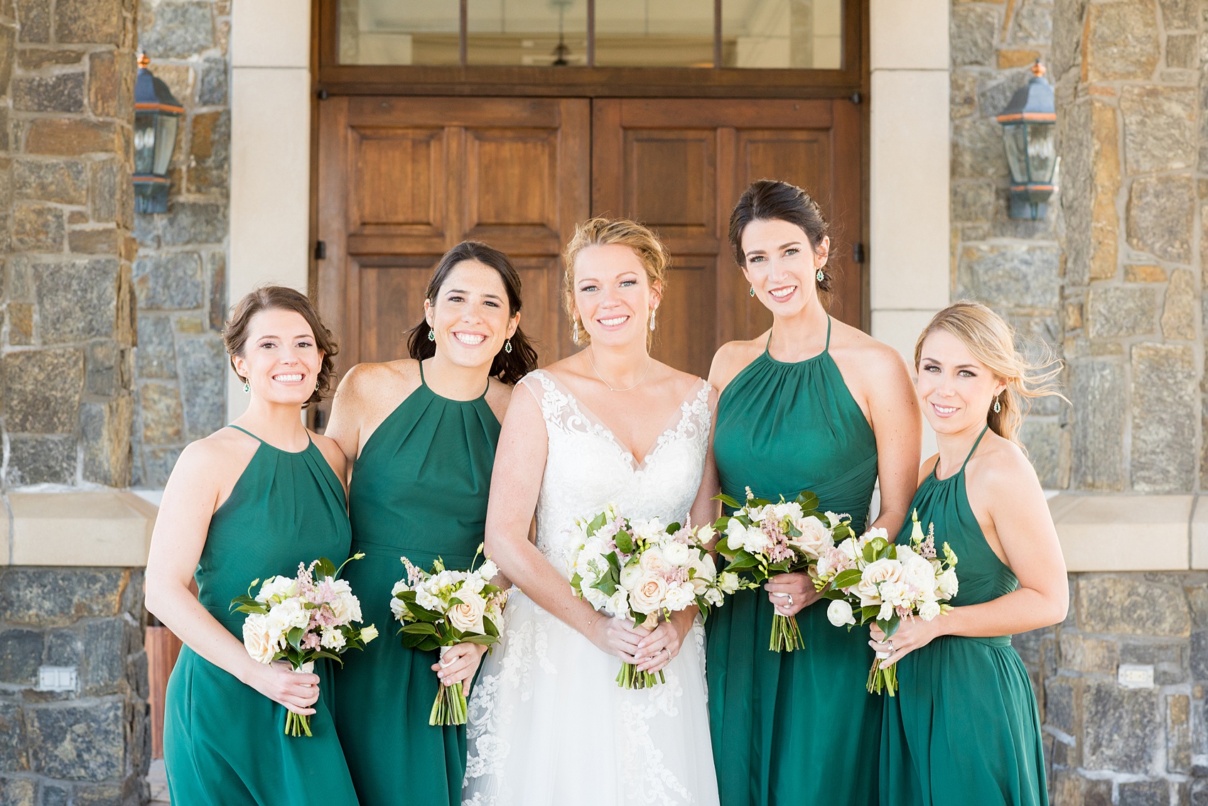 Saratoga Springs destination wedding photos by Mikkel Paige Photography. The bridesmaids wore green gowns and held white and pink bouquets with roses and astilbe at Saratoga National Golf Club venue for a spring celebration. #SaratogaSpringsNY #SaratogaSprings #mikkelpaige #NYwedding #destinationwedding