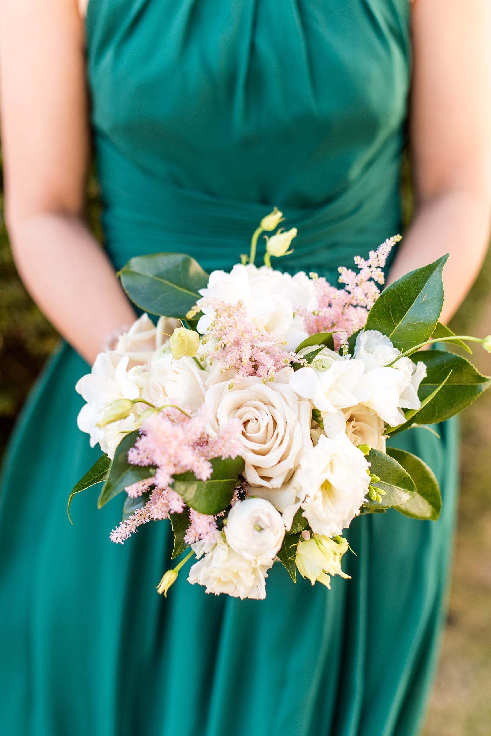 Saratoga Springs destination wedding photos by Mikkel Paige Photography. The bridesmaids wore green and held white and pink bouquets with roses and astilbe. The spring reception was held at Saratoga National Golf Club venue. #SaratogaSpringsNY #SaratogaSprings #mikkelpaige #NYwedding #destinationwedding