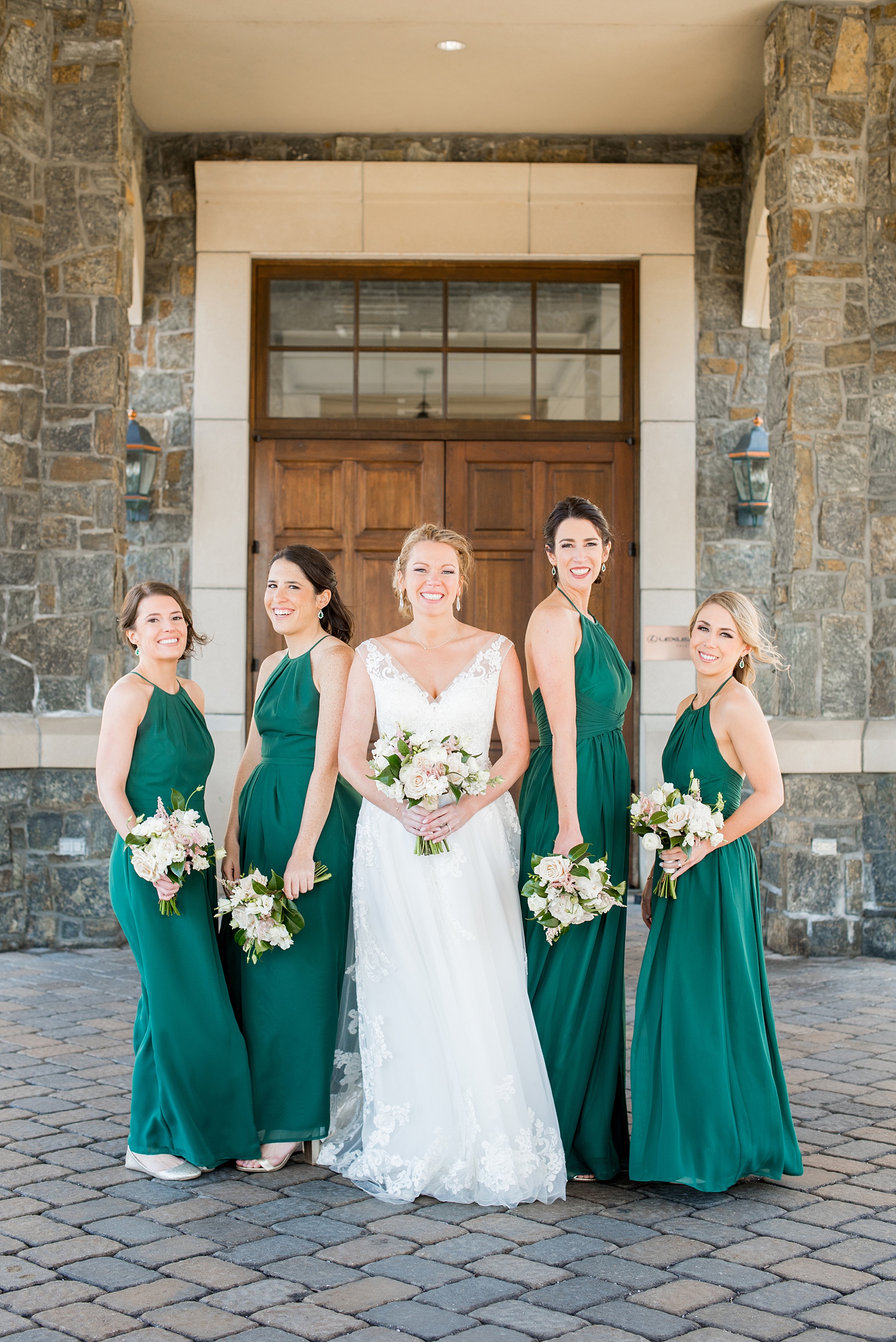 Saratoga Springs destination wedding photos by Mikkel Paige Photography. The bridesmaids wore green gowns and held white and pink bouquets with roses and astilbe at Saratoga National Golf Club venue for a spring celebration. #SaratogaSpringsNY #SaratogaSprings #mikkelpaige #NYwedding #destinationwedding 