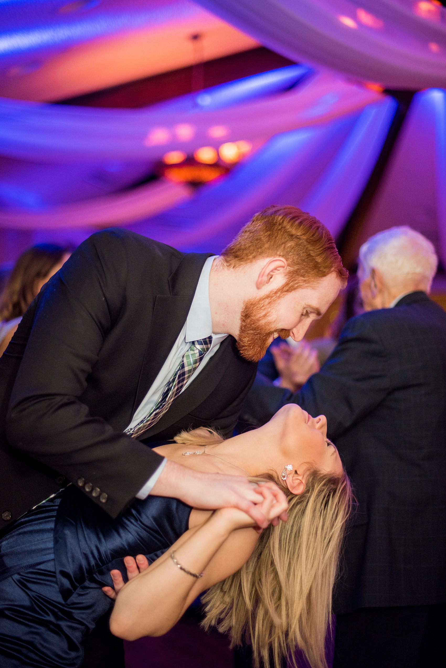 Saratoga Springs destination wedding photos by Mikkel Paige Photography. The party was held at Saratoga National Golf Club venue. Guests enjoyed dancing the night away with a DJ and specialty lighting. #SaratogaSpringsNY #SaratogaSprings #mikkelpaige #NYwedding #destinationwedding 