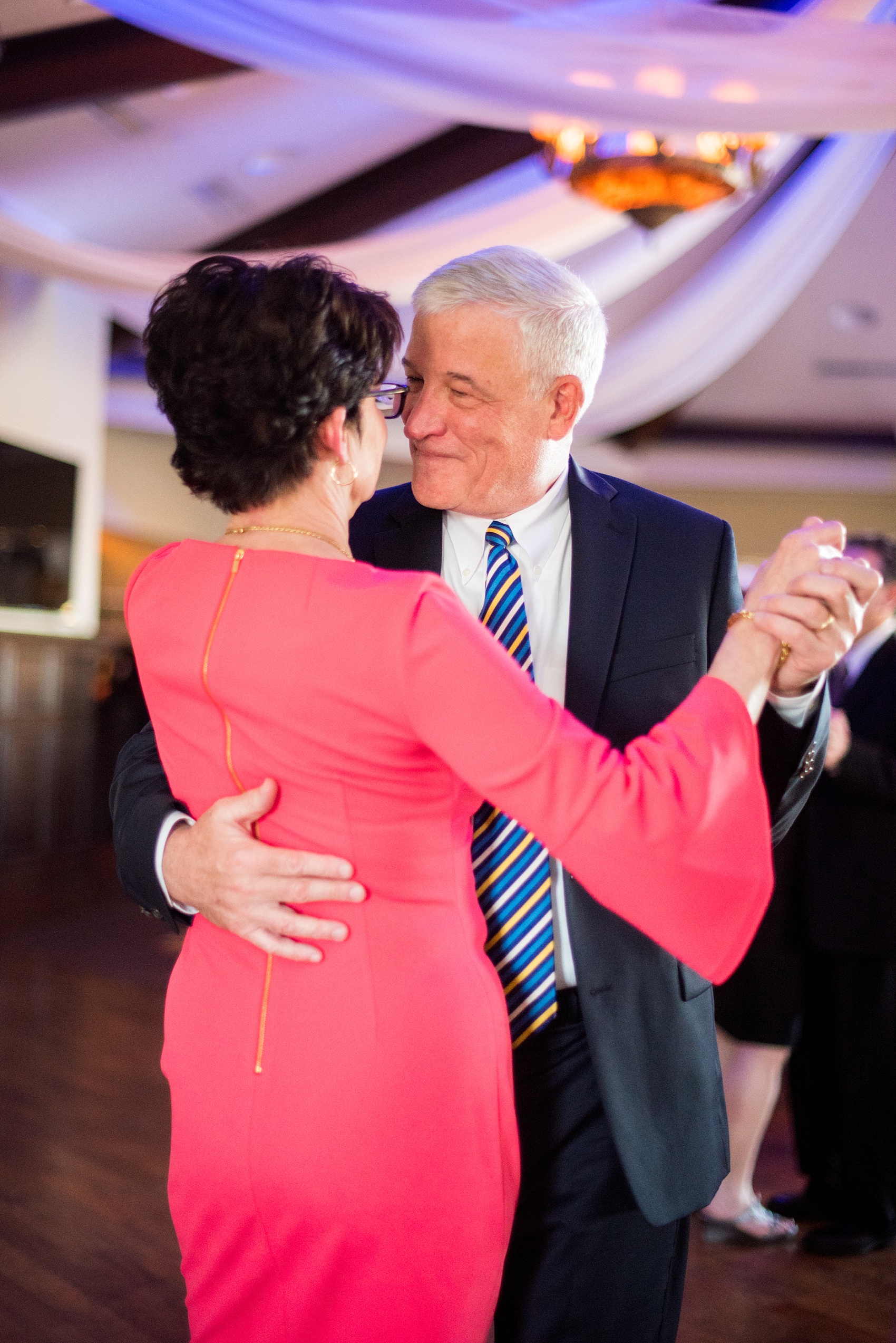 Saratoga Springs destination wedding photos by Mikkel Paige Photography. The party was held at Saratoga National Golf Club venue. Guests enjoyed dancing the night away with a DJ and specialty lighting. #SaratogaSpringsNY #SaratogaSprings #mikkelpaige #NYwedding #destinationwedding 