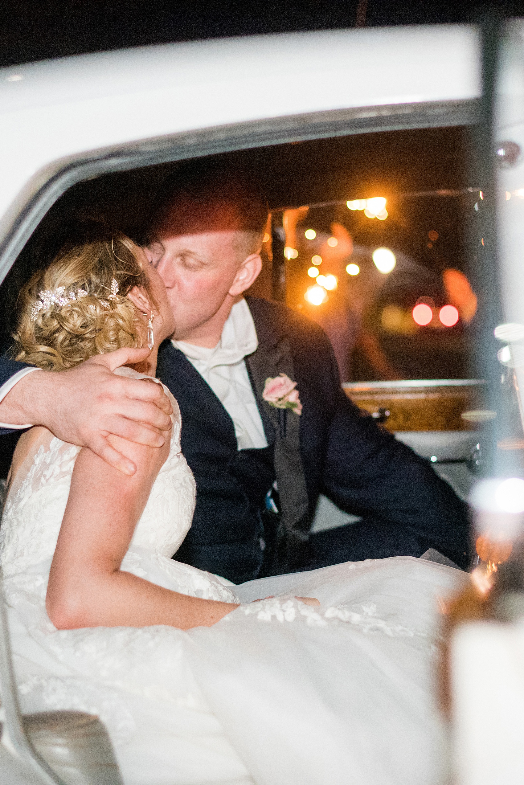 Saratoga Springs destination wedding photos by Mikkel Paige Photography. The party was held at Saratoga National Golf Club venue. The bride and groom did a sparkler exit from their spring reception and left in a vintage Rolls Royce car. #SaratogaSpringsNY #SaratogaSprings #mikkelpaige #NYwedding #destinationwedding #sparklerexit