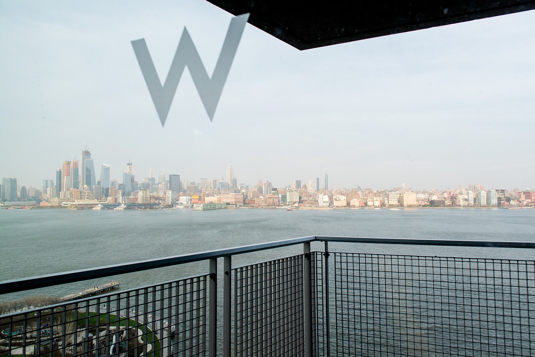 W Hoboken wedding photos by Mikkel Paige Photography. Pictures in this well known New Jersey venue with a view of the Manhattan skyline. #mikkelpaige #HobokenWedding #NewJerseyPhotographer #NewYorkCityPhotographer #NYCweddingphotographer #brideandgroomphotos #redpeonies #romanticwedding #springwedding #CityWedding