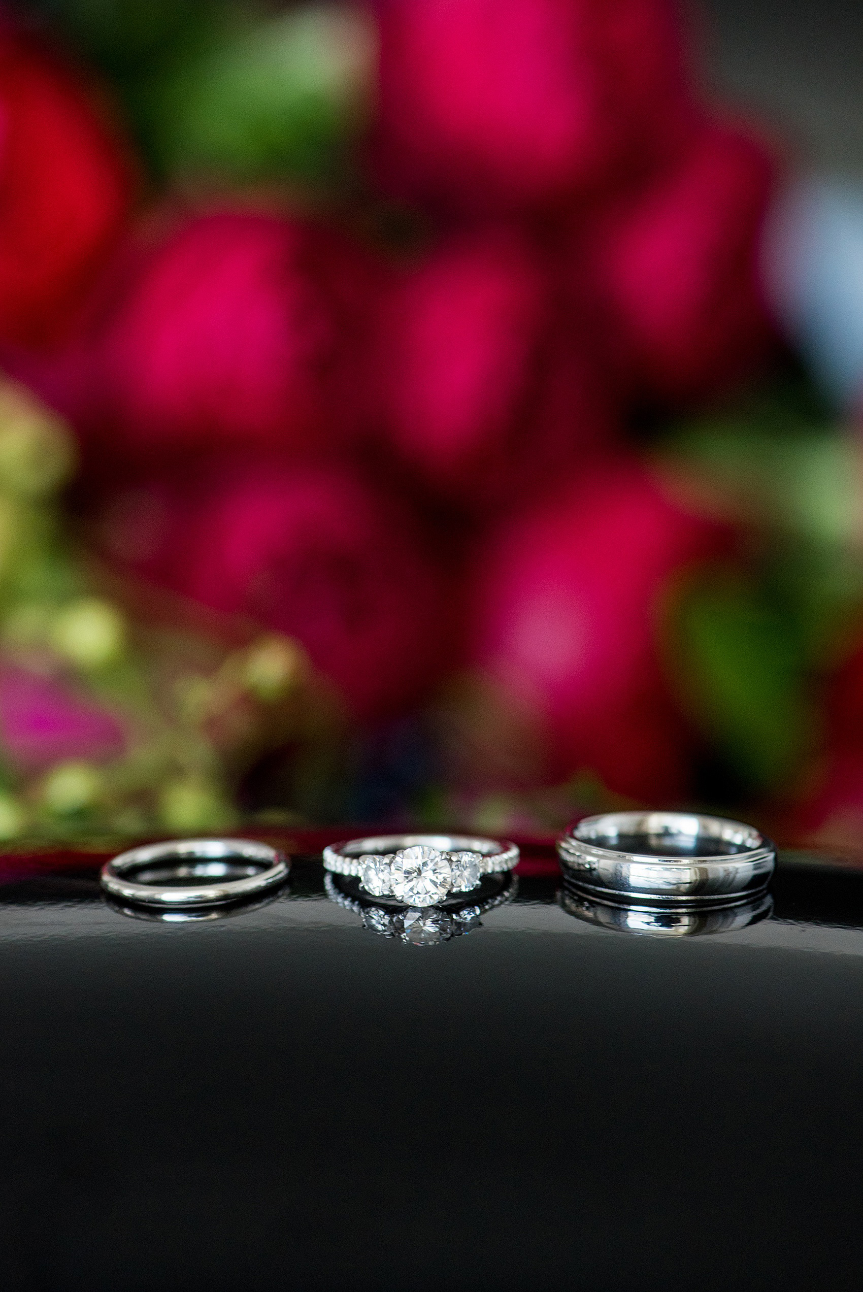 W Hoboken wedding photos by Mikkel Paige Photography. Picture of the bride and groom's white gold and diamond rings. #mikkelpaige #HobokenWedding #NewJerseyPhotographer #NewYorkCityPhotographer #NYCweddingphotographer #brideandgroomphotos #redpeonies #romanticwedding #springwedding #CityWedding