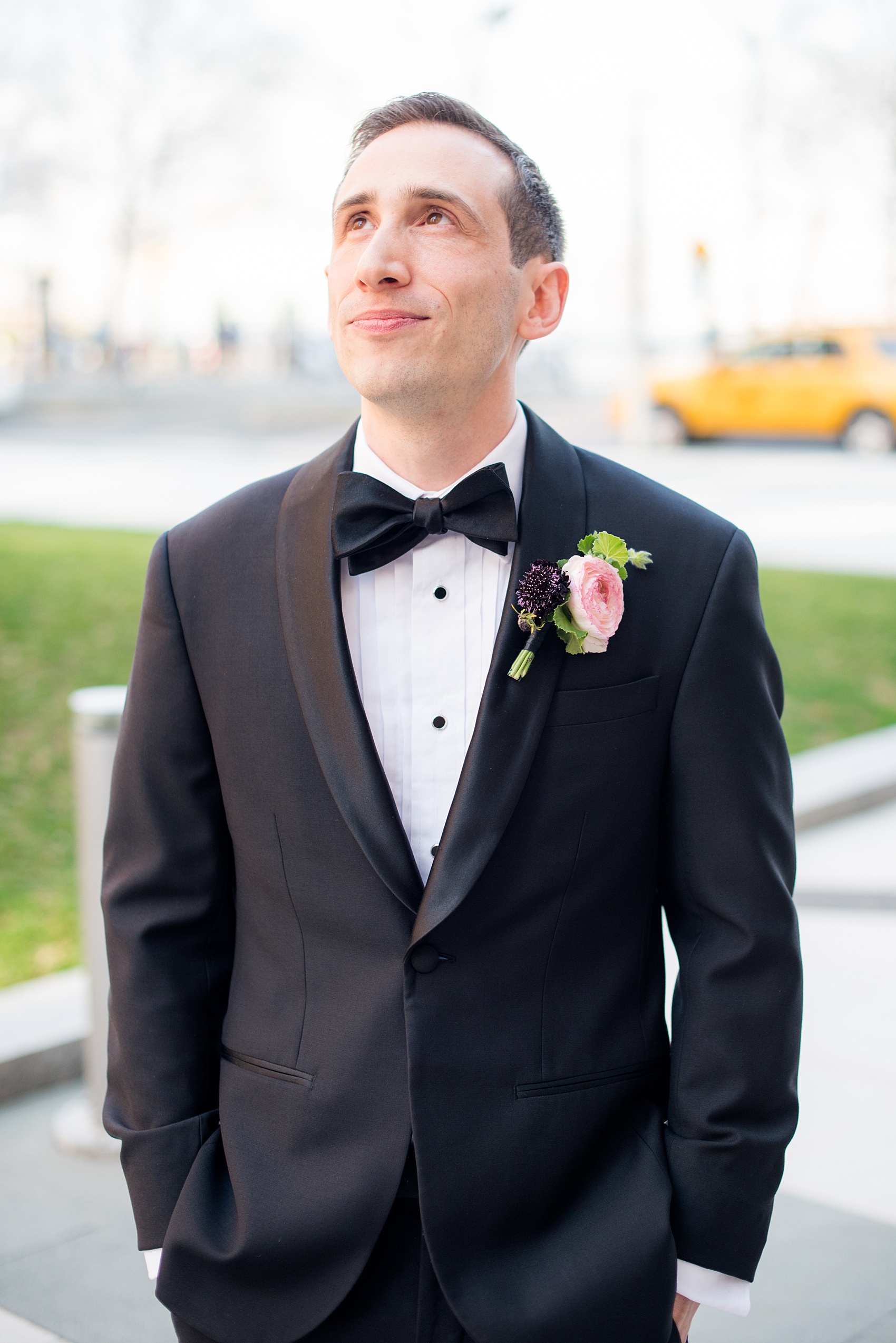 W Hoboken wedding photos by Mikkel Paige Photography. Pictures in this well known New Jersey area with a view of the Manhattan skyline. The groom awaited his bride for their first look outside of the venue. #mikkelpaige #HobokenWedding #NewJerseyPhotographer #NewYorkCityPhotographer #NYCweddingphotographer #brideandgroomphotos #redpeonies #romanticwedding #springwedding #CityWedding