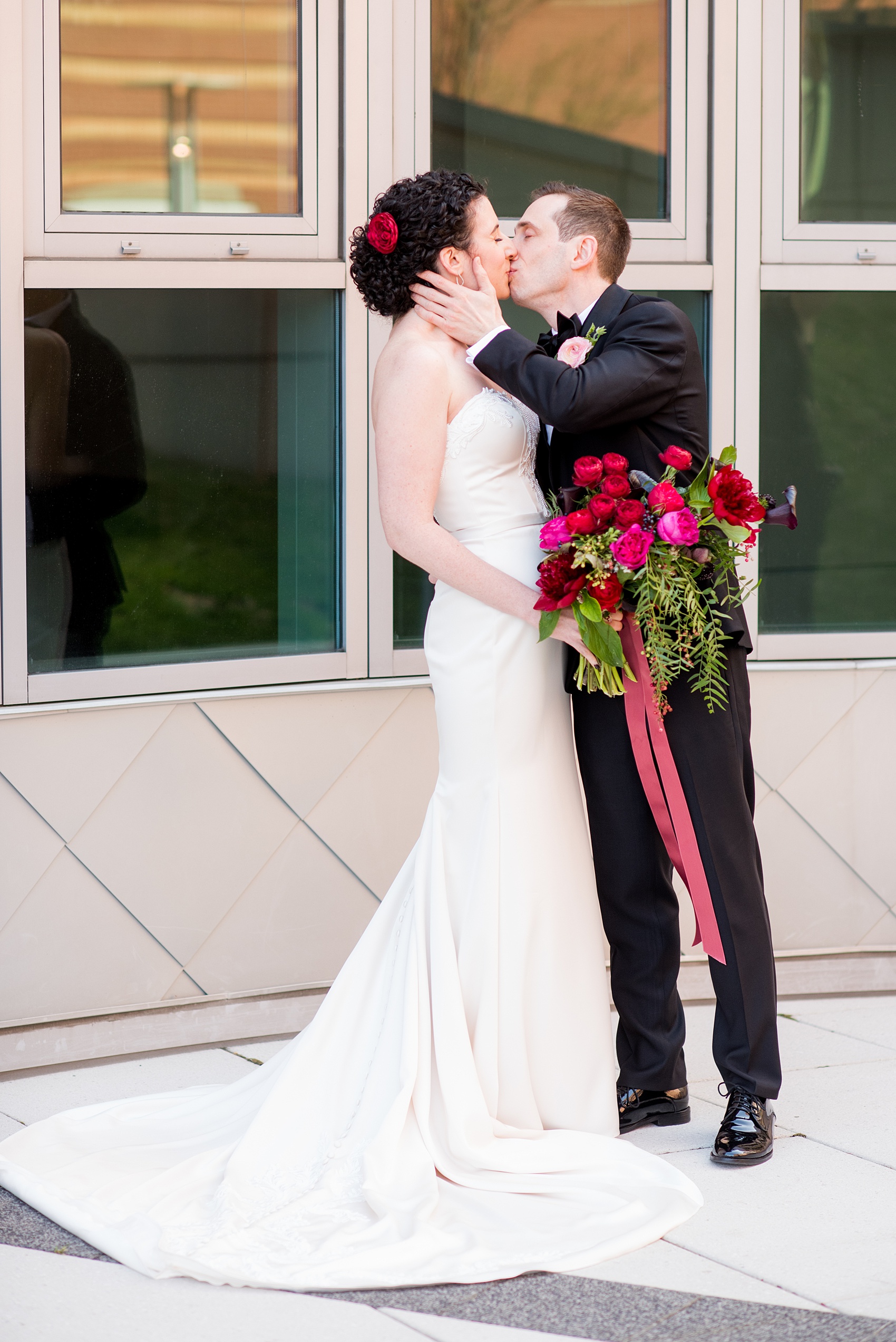 W Hoboken Wedding Photos by Mikkel Paige Photography. Spring wedding overlooking the NYC skyline, with a sexy black, deep red, burgundy and fuchsia color palette. Picture of the bride and groom during golden hour. #HobokenWedding #mikkelpaige #springwedding #romanticwedding #NewJerseyWeddingPhotos