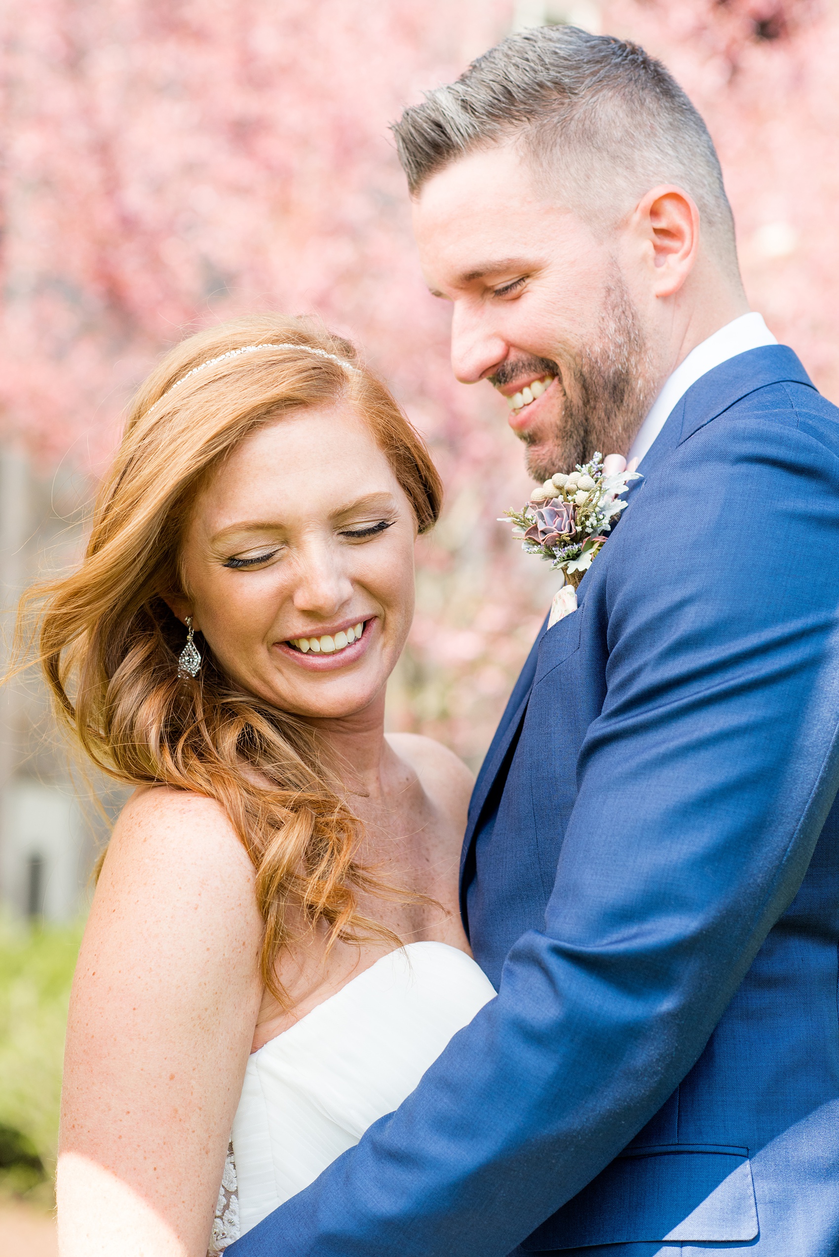 Crystal Springs Resort wedding photos in New Jersey, with photographer Mikkel Paige Photography. The couple’s spring wedding had an outdoor ceremony with photos at this rustic, woodsy venue showing their blue and pink palette decor from getting ready to their reception. The bride and groom's love and laughter echoed through the day with spring flowers like cherry blossoms! Click through to see their complete wedding recap! #NewJerseywedding #MikkelPaige #NJweddingphotographer #NJphotographer