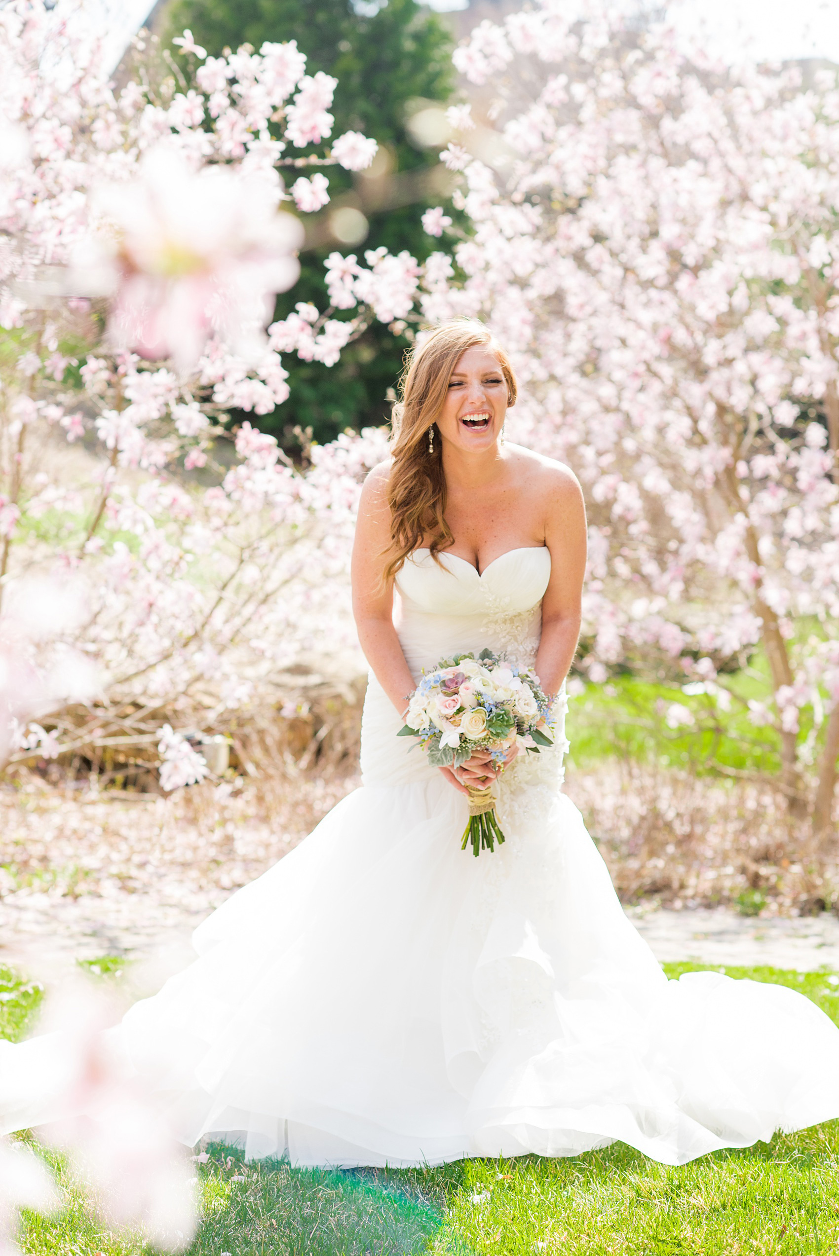 Crystal Springs Resort wedding photos in New Jersey, with photographer Mikkel Paige Photography. The couple’s spring wedding had an outdoor ceremony with photos at this rustic, woodsy venue showing their blue and pink palette decor from getting ready to their reception. The bride's love and laughter echoed through the day with spring flowers like cherry blossoms in their pictures! Click through to see their complete wedding recap! #NewJerseywedding #MikkelPaige #NJweddingphotographer #NJphotographer