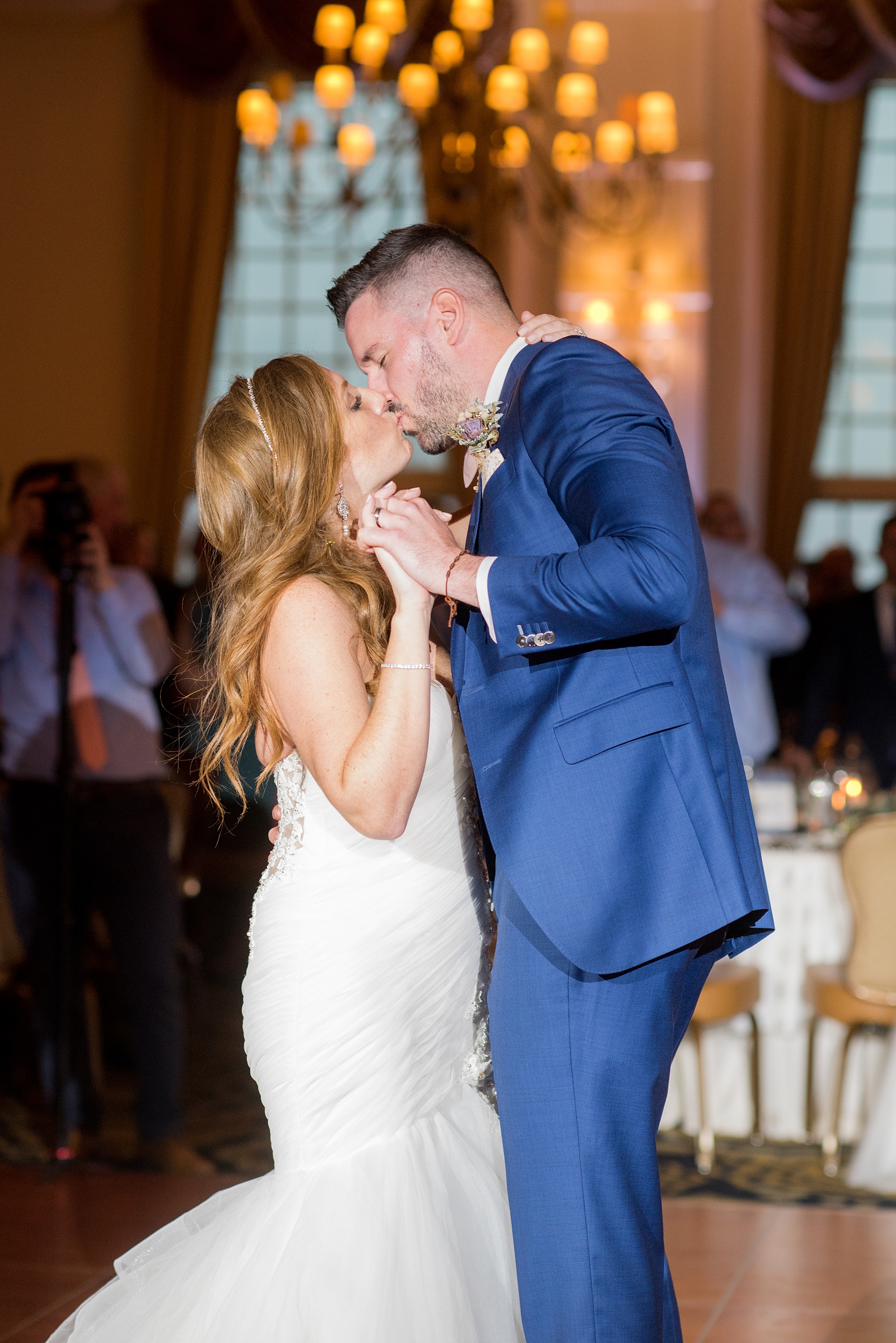 Crystal Springs Resort wedding photos in New Jersey, with photographer Mikkel Paige Photography. The couple’s spring wedding had an outdoor ceremony with photos at this rustic, woodsy venue showing their blue and pink palette decor from getting ready to their reception. This picture shows the bride and groom dancing their first dance. Click through to see their complete wedding recap! #NewJerseywedding #MikkelPaige #NJweddingphotographer #NJphotographer #springwedding #pinkandblue #escortcards #escortcardtable