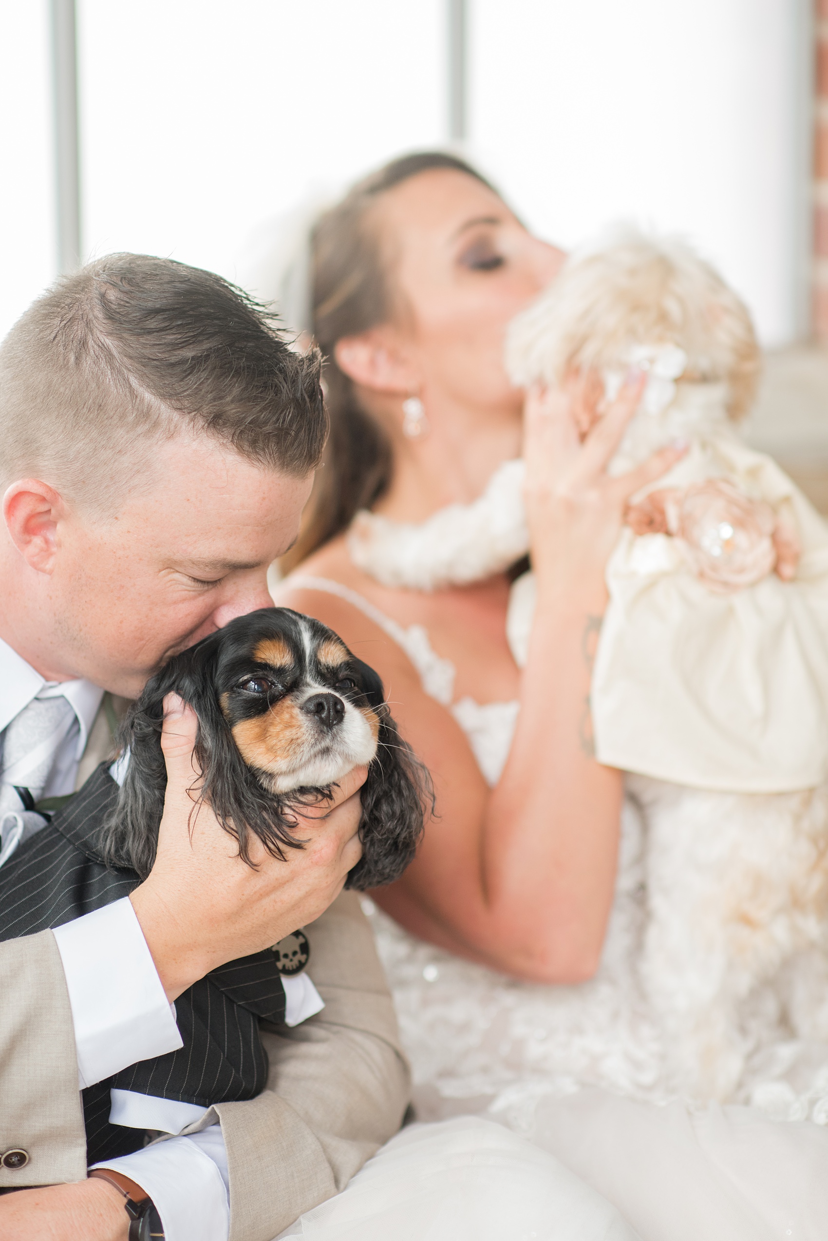 The Rickhouse wedding photos by Mikkel Paige photography in Durham, North Carolina. This urban venue has all the charm of the south for this bride and groom's spring wedding! The bride and groom's dog joining them for photos. Click to see more from their day! #mikkelpaige #northcarolina #southernwedding #TheRickhouseDurham #rosegoldandpink #weddingdog